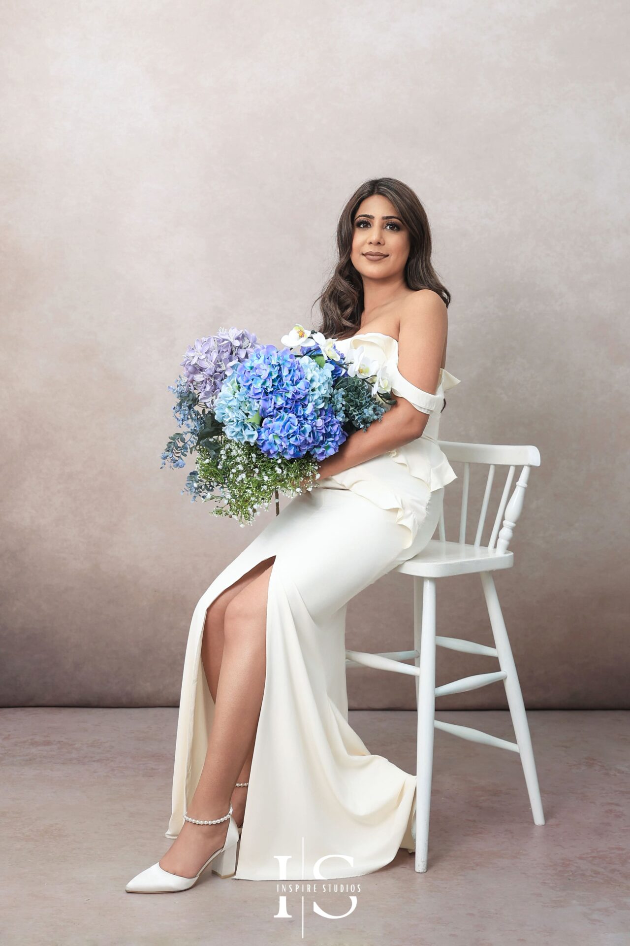 Bride vintage photoshoot in London studio with timeless elegance.