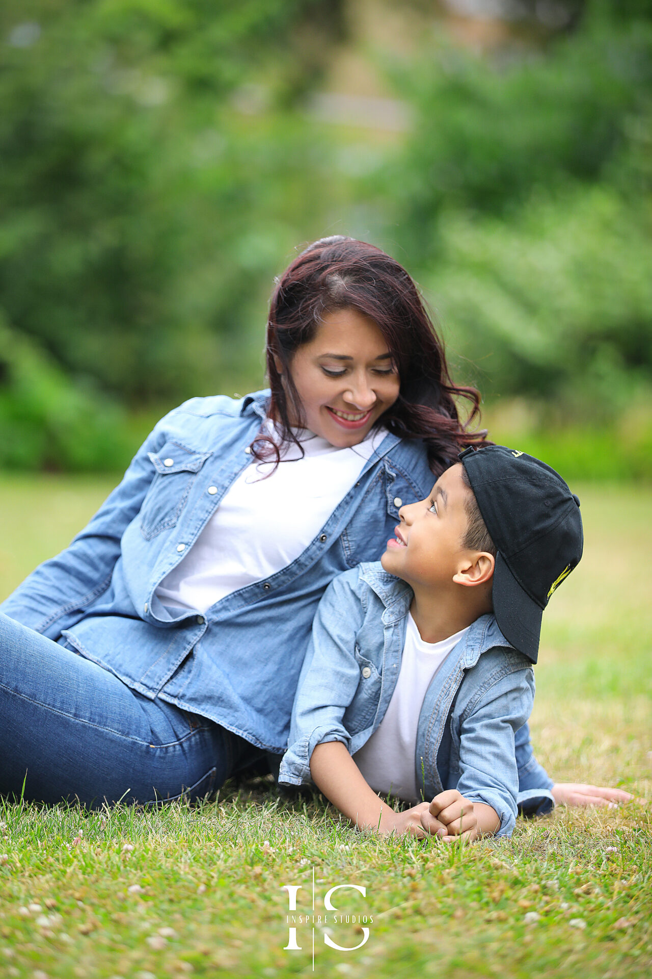 Candid mother and son photoshoot in Valentines Park, London, with joyful interactions.