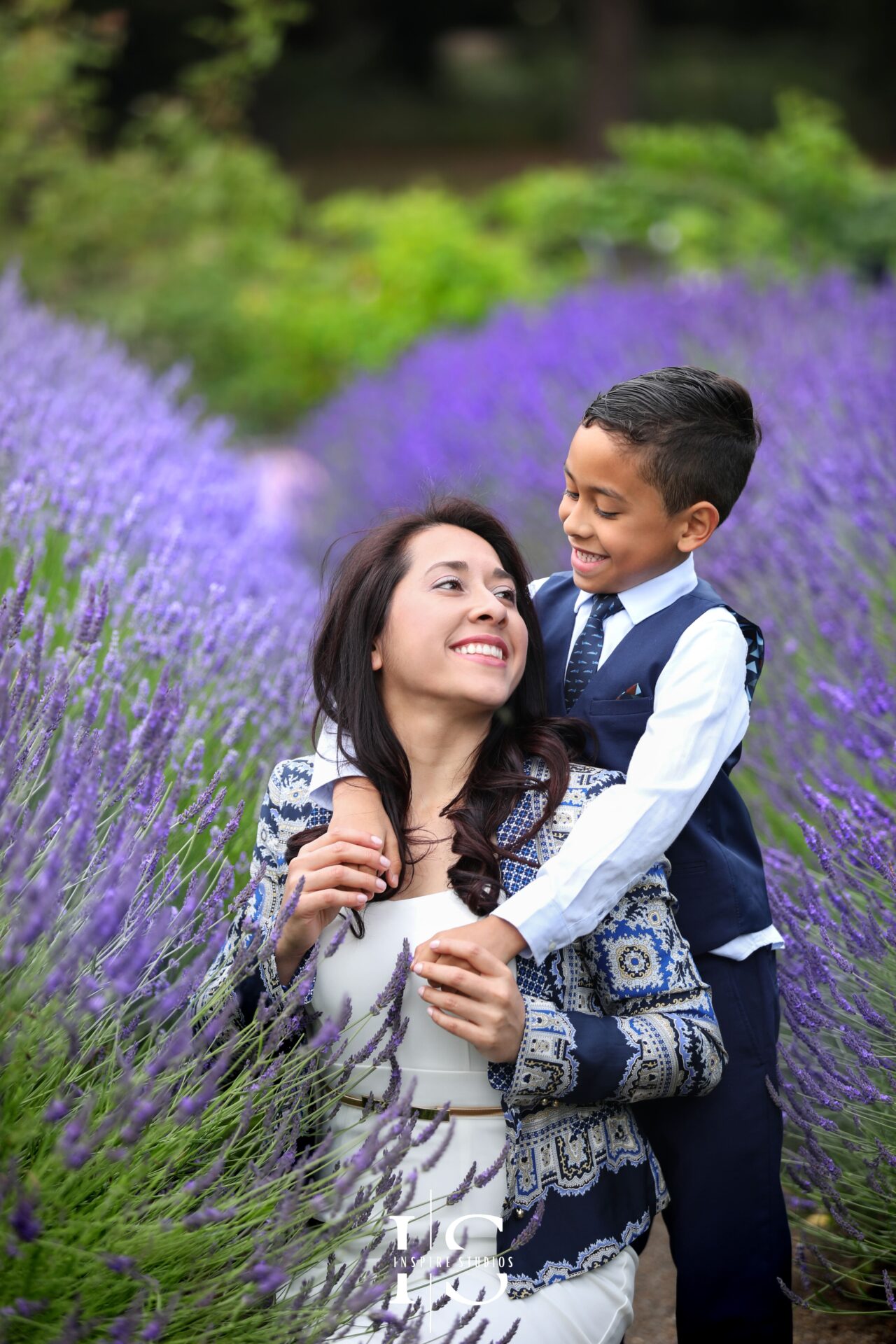 Candid family photography in a London park, capturing natural interactions and emotions.