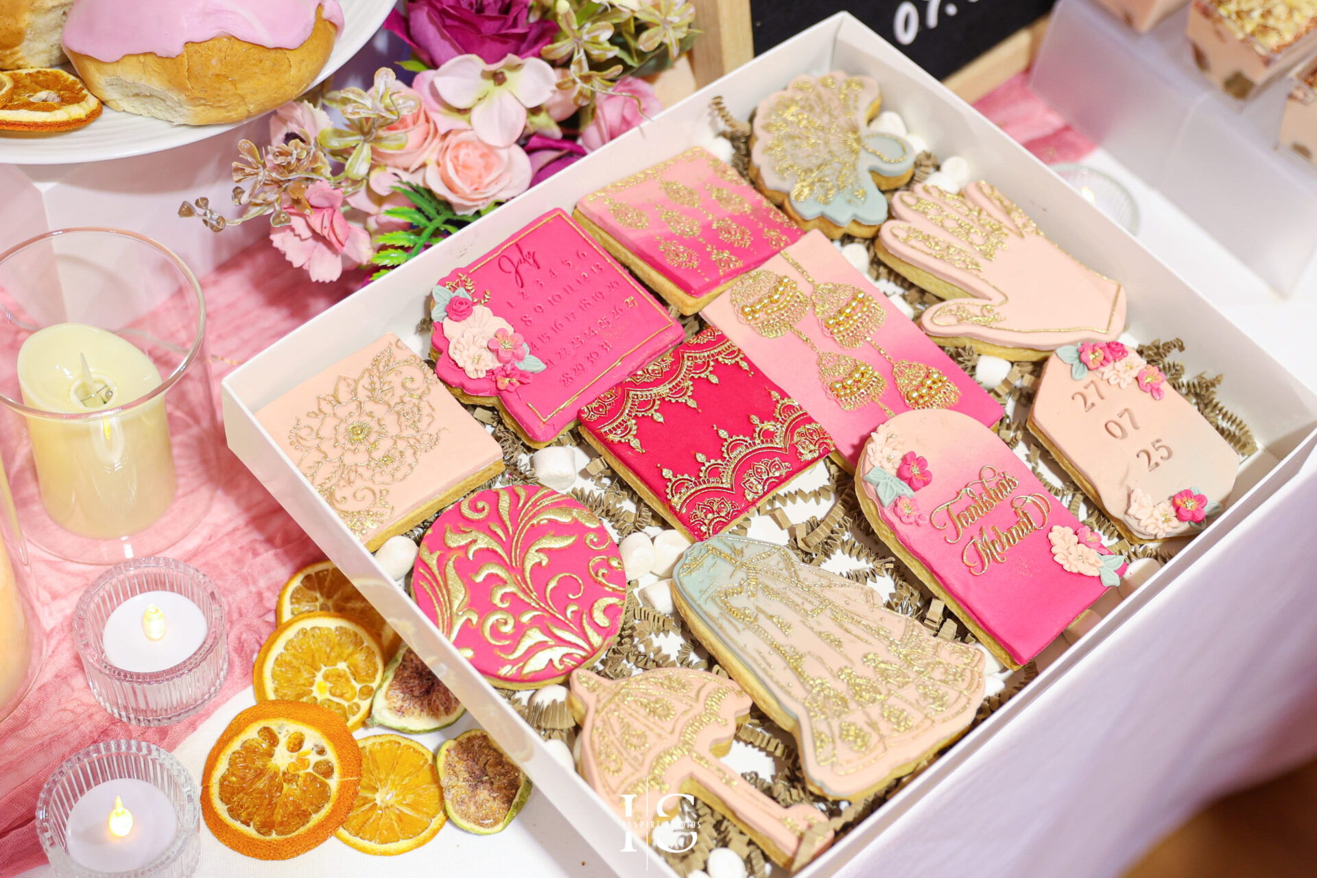 Colorful sweets displayed at a Mehndi celebration in London.
