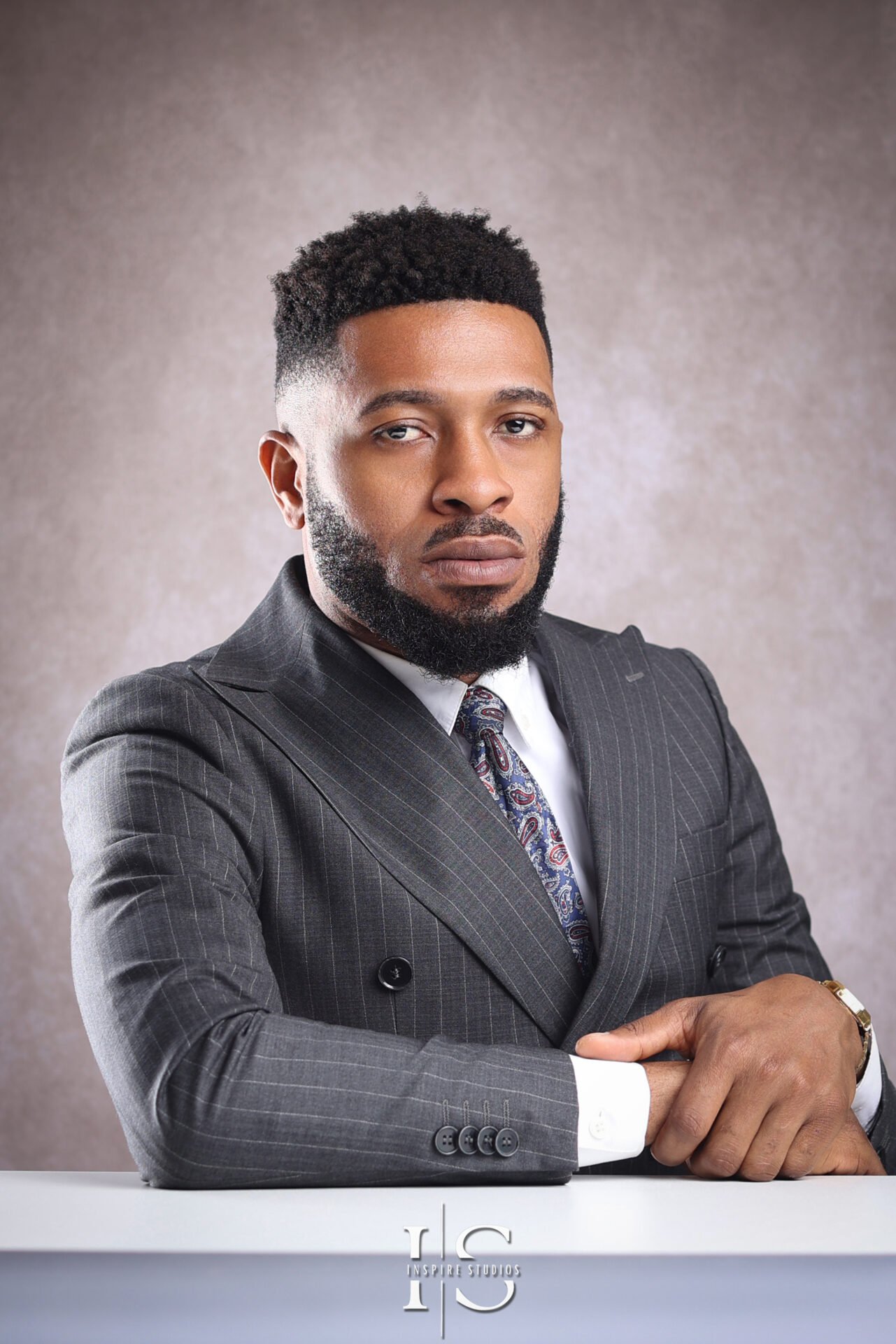 Confident professional headshot of a businesswoman in London studio