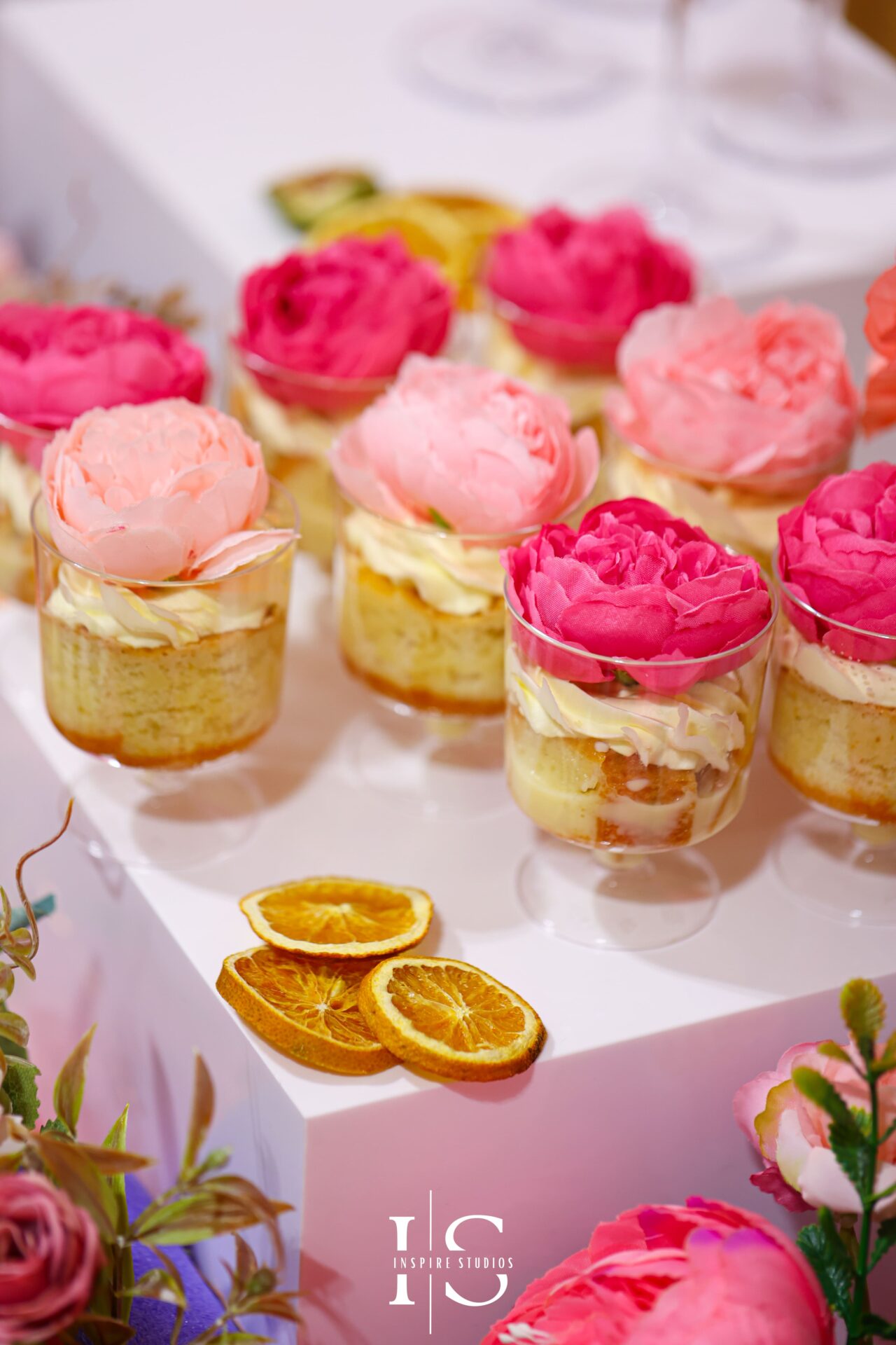 Dessert table setup at a Bangladeshi Mehndi wedding in London.