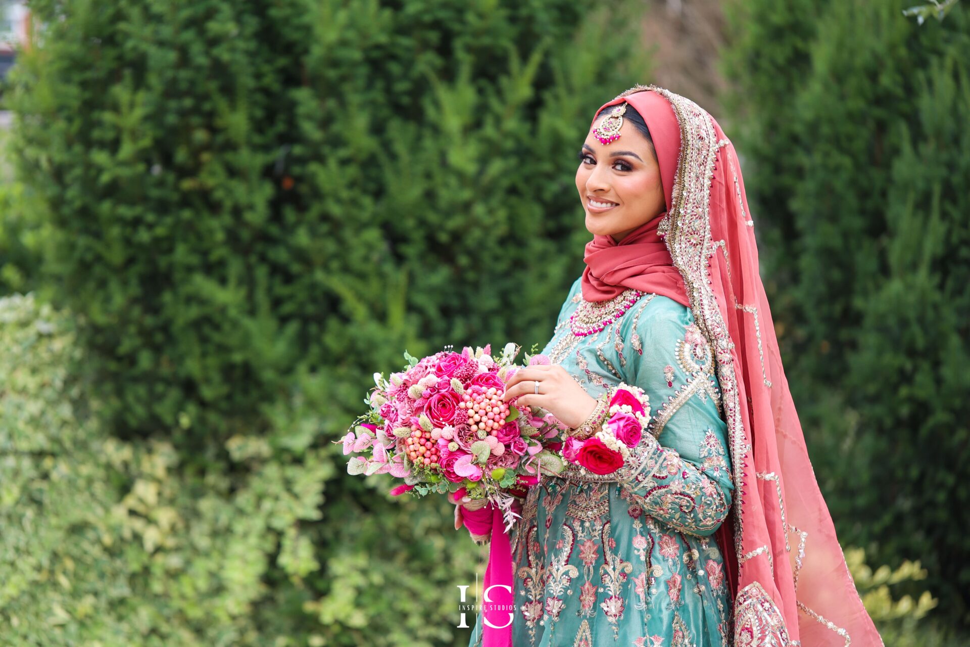 Female photographer capturing portraits of a Mehndi bride in London.