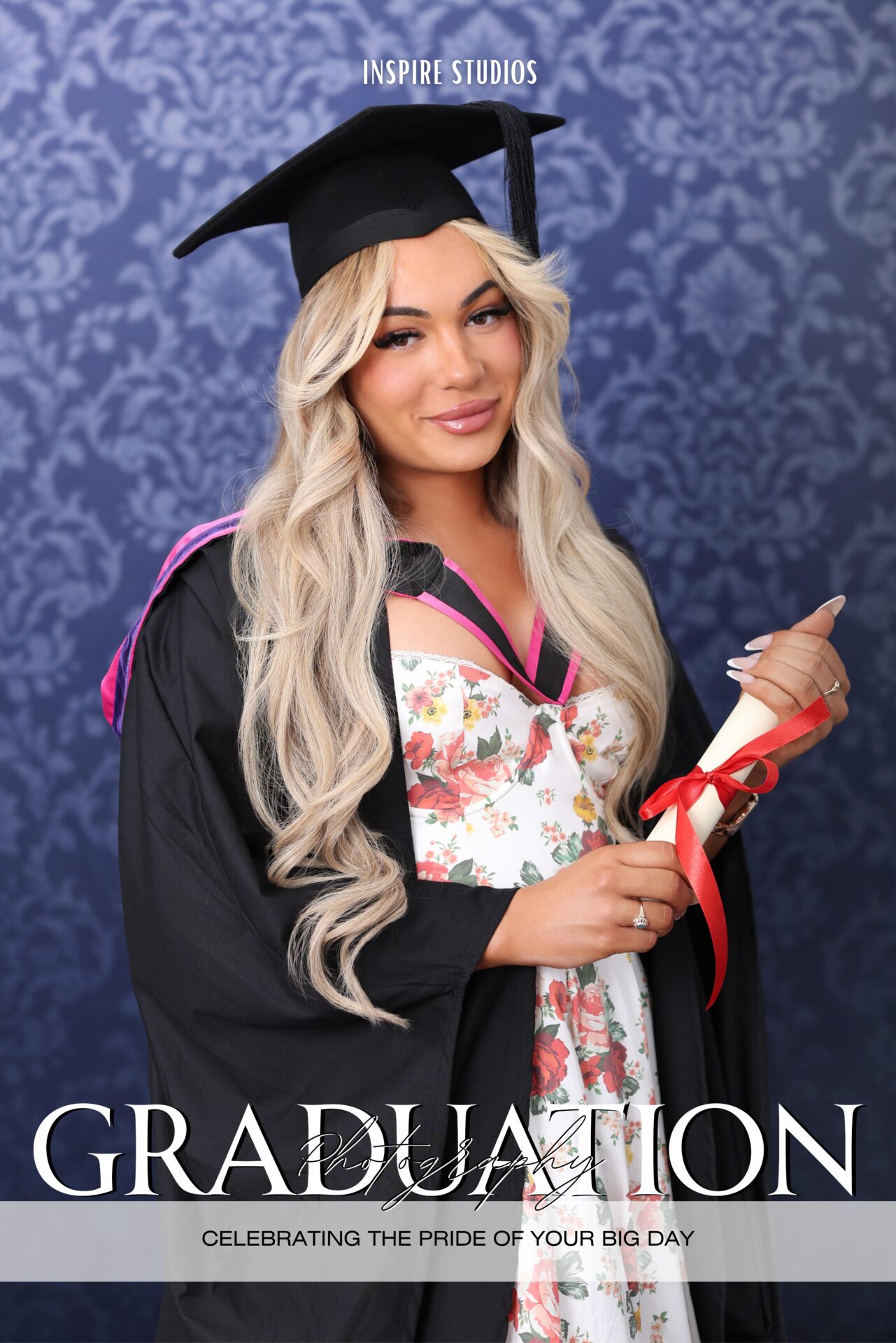 Graduate in cap and gown in studio