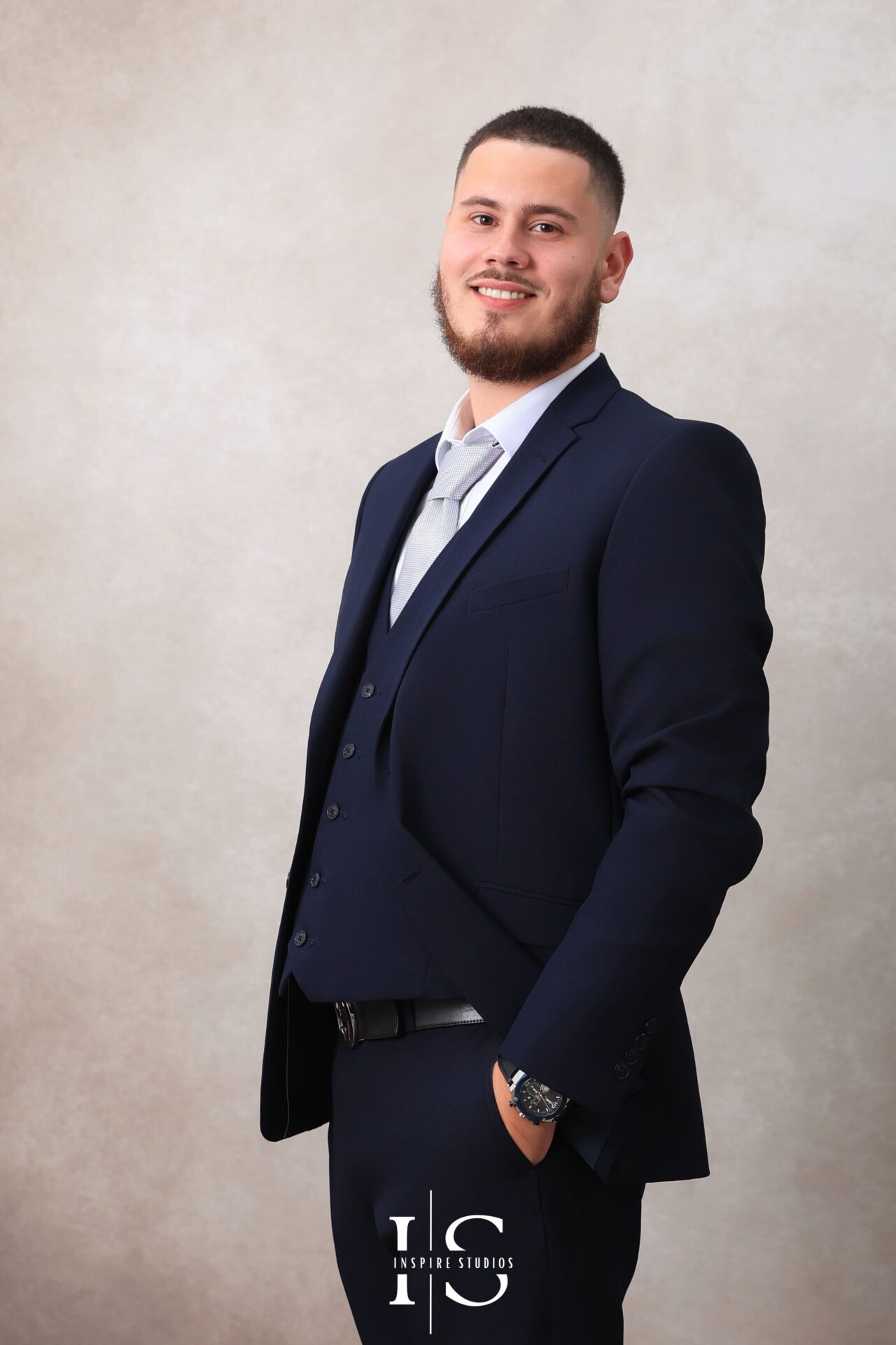 Groom in vintage-inspired studio photoshoot in London.