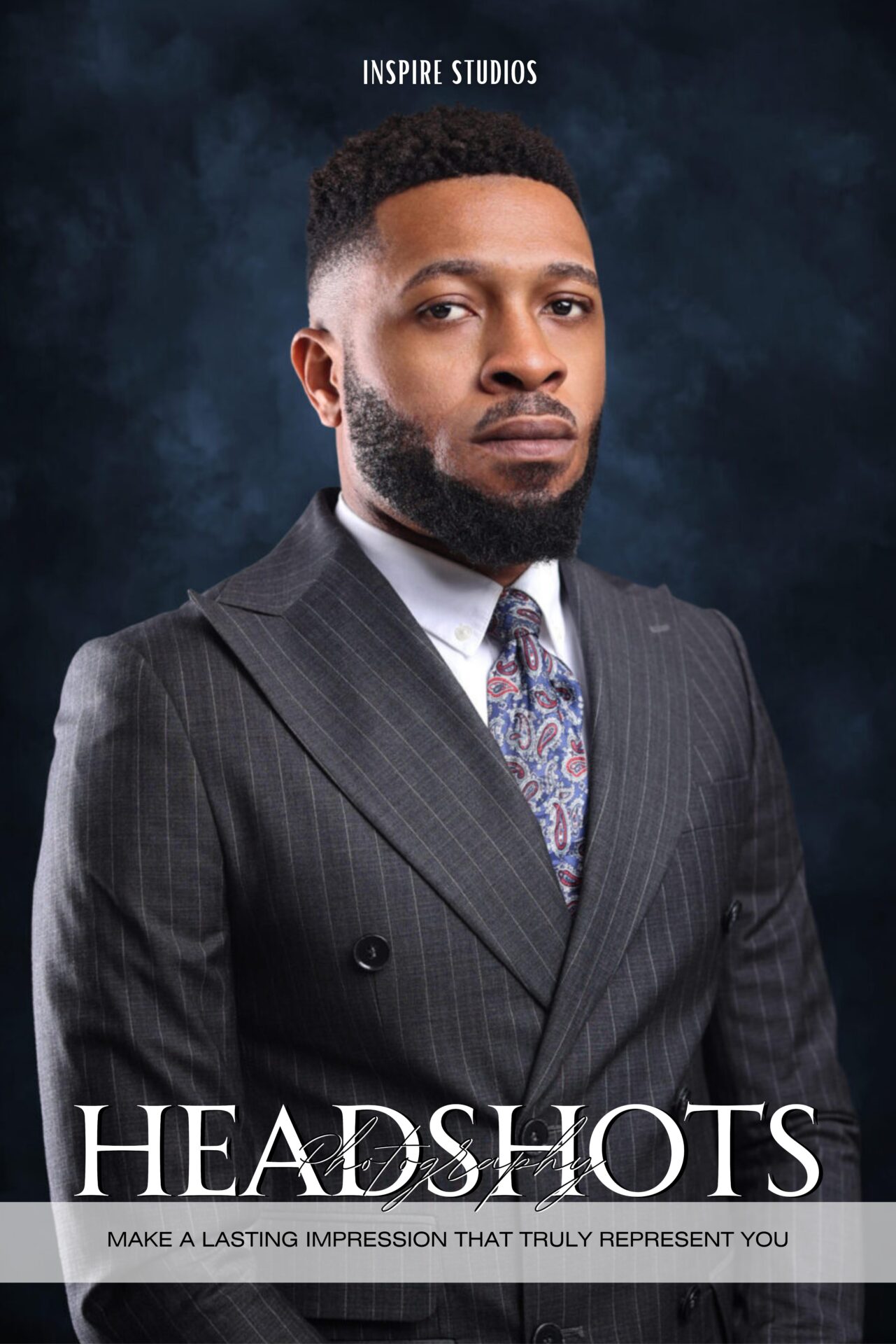 Professional studio headshot of smiling adult