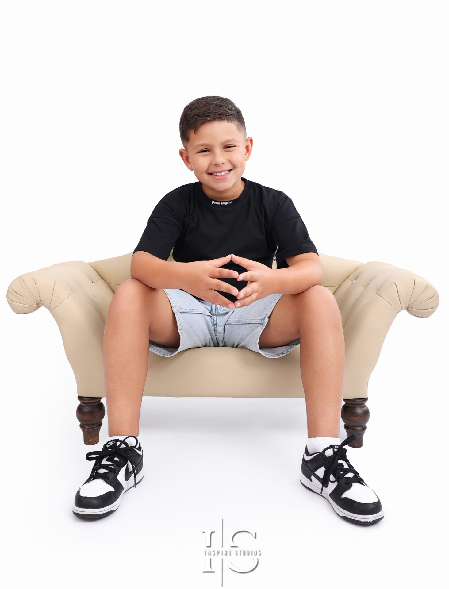 Child photographed during a studio headshot session in London.