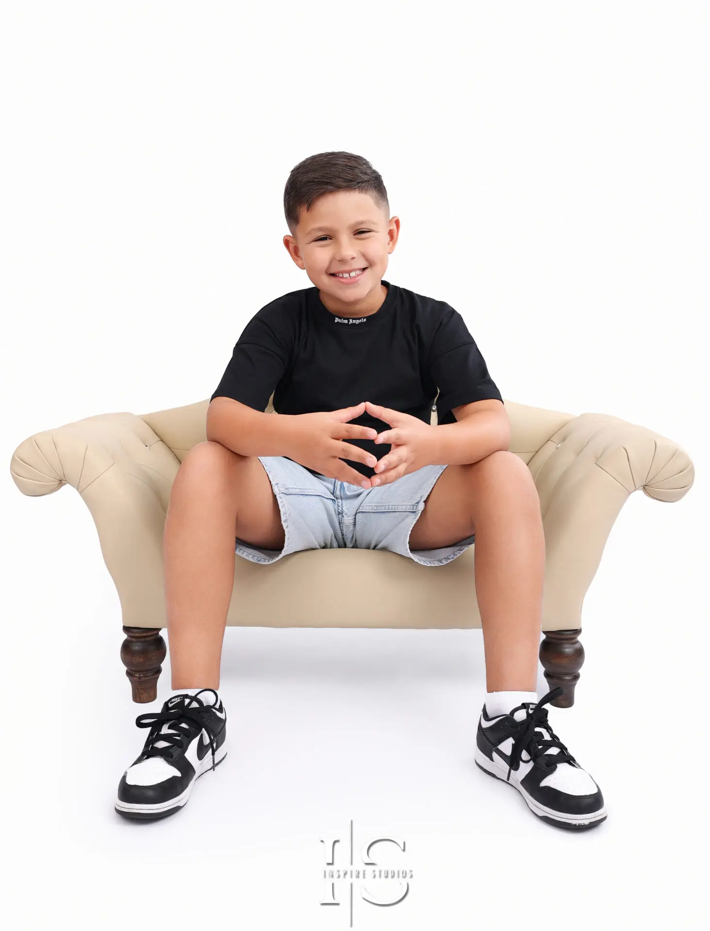 Child photographed during a studio headshot session in London.