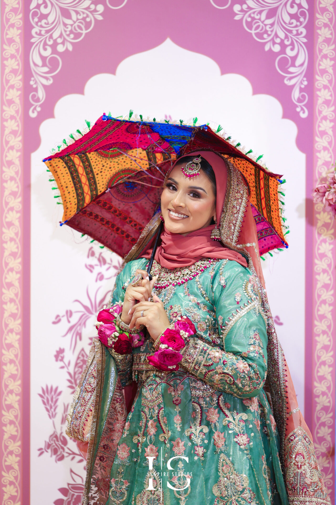 Inspire Studios female wedding photographer covering Mehndi event.