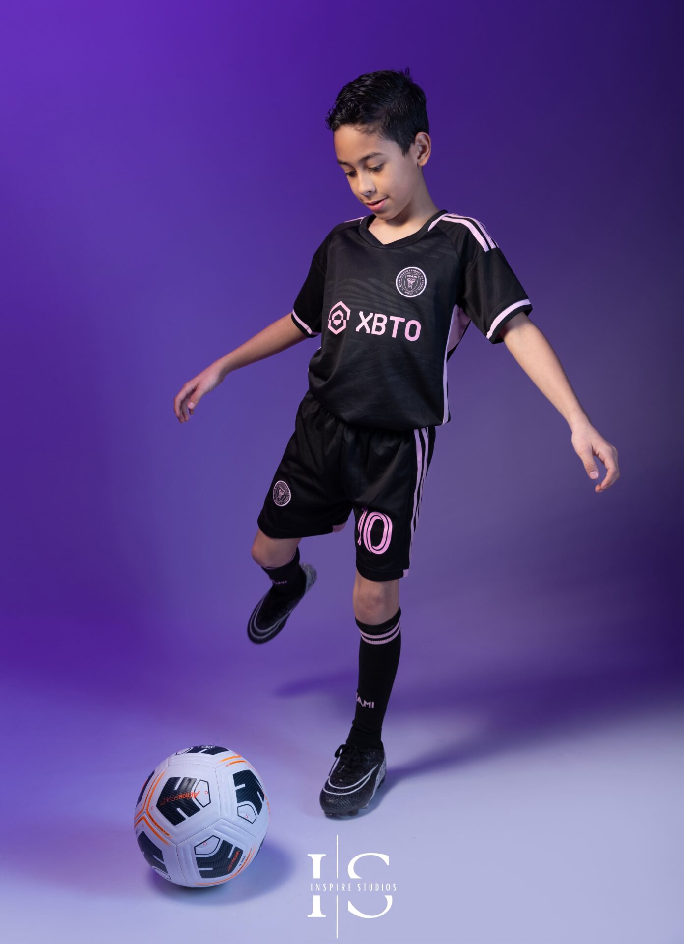 Child in London studio football props photoshoot session