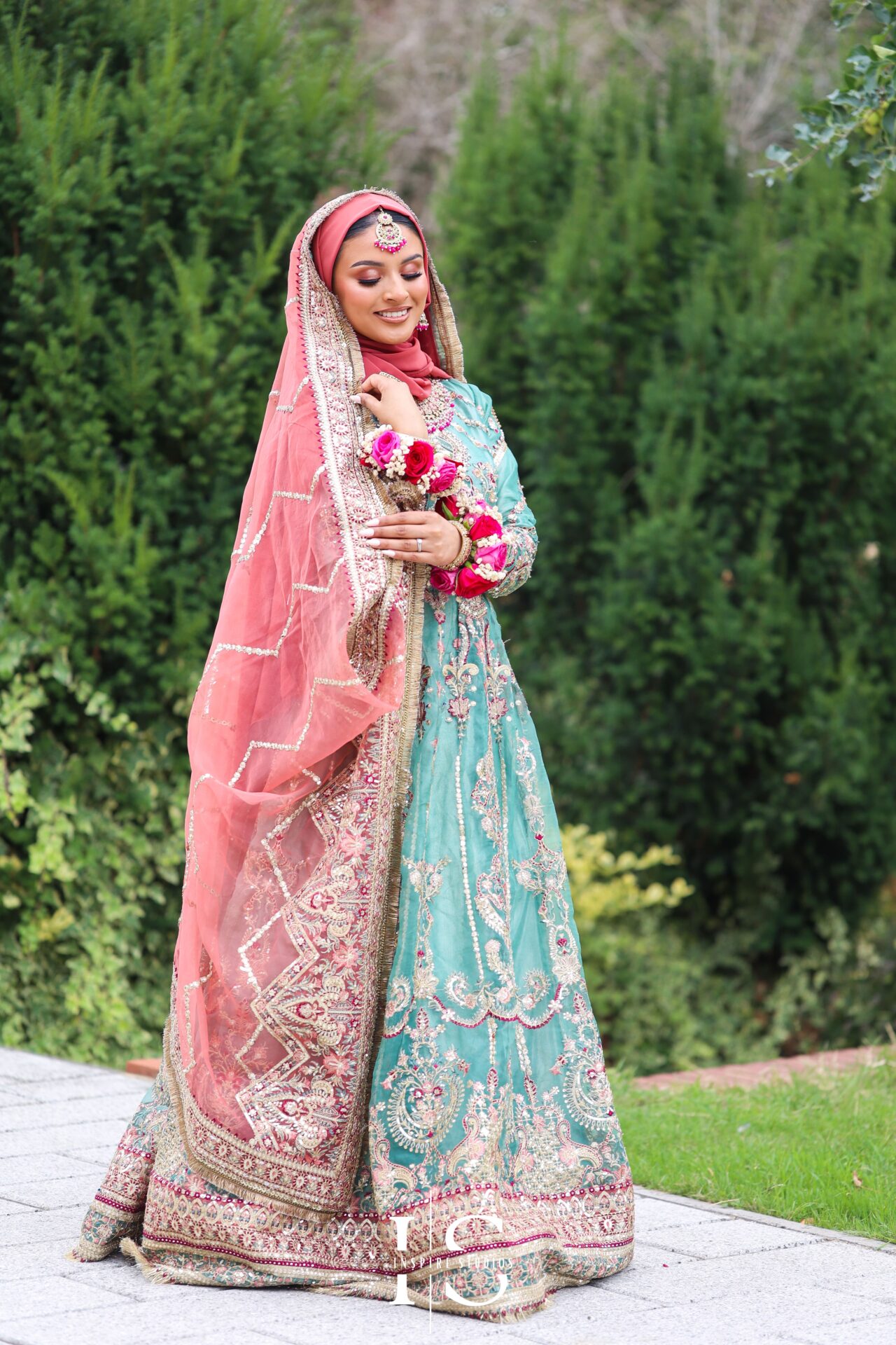 Close-up portraits of Mehndi bride with traditional details.