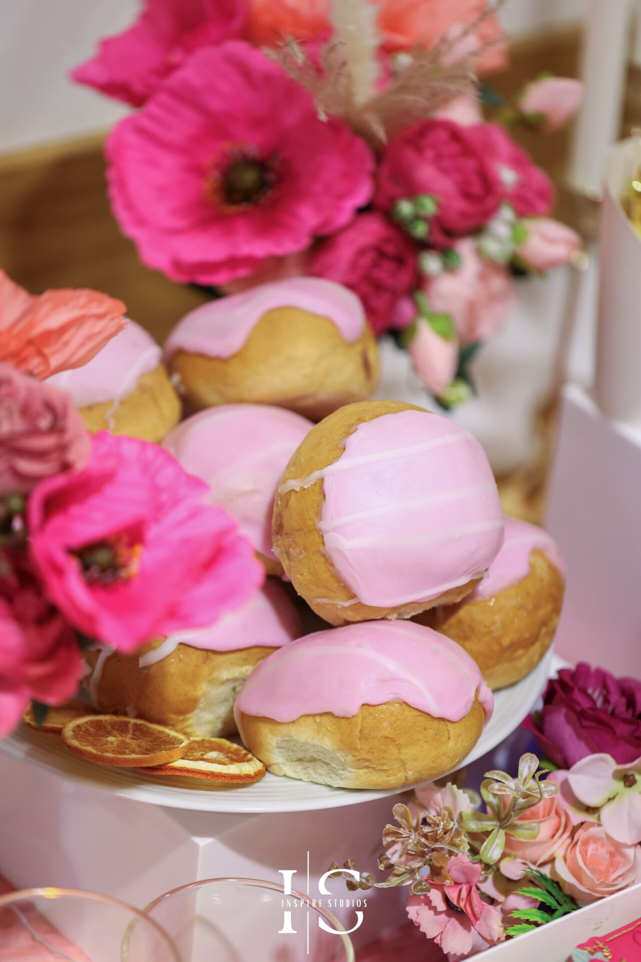 Mehndi desserts displayed at a wedding celebration in London.