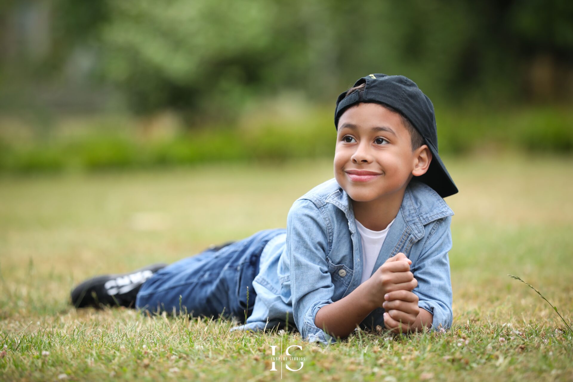 Family enjoying a professional park photoshoot in London by Inspire Studios.
