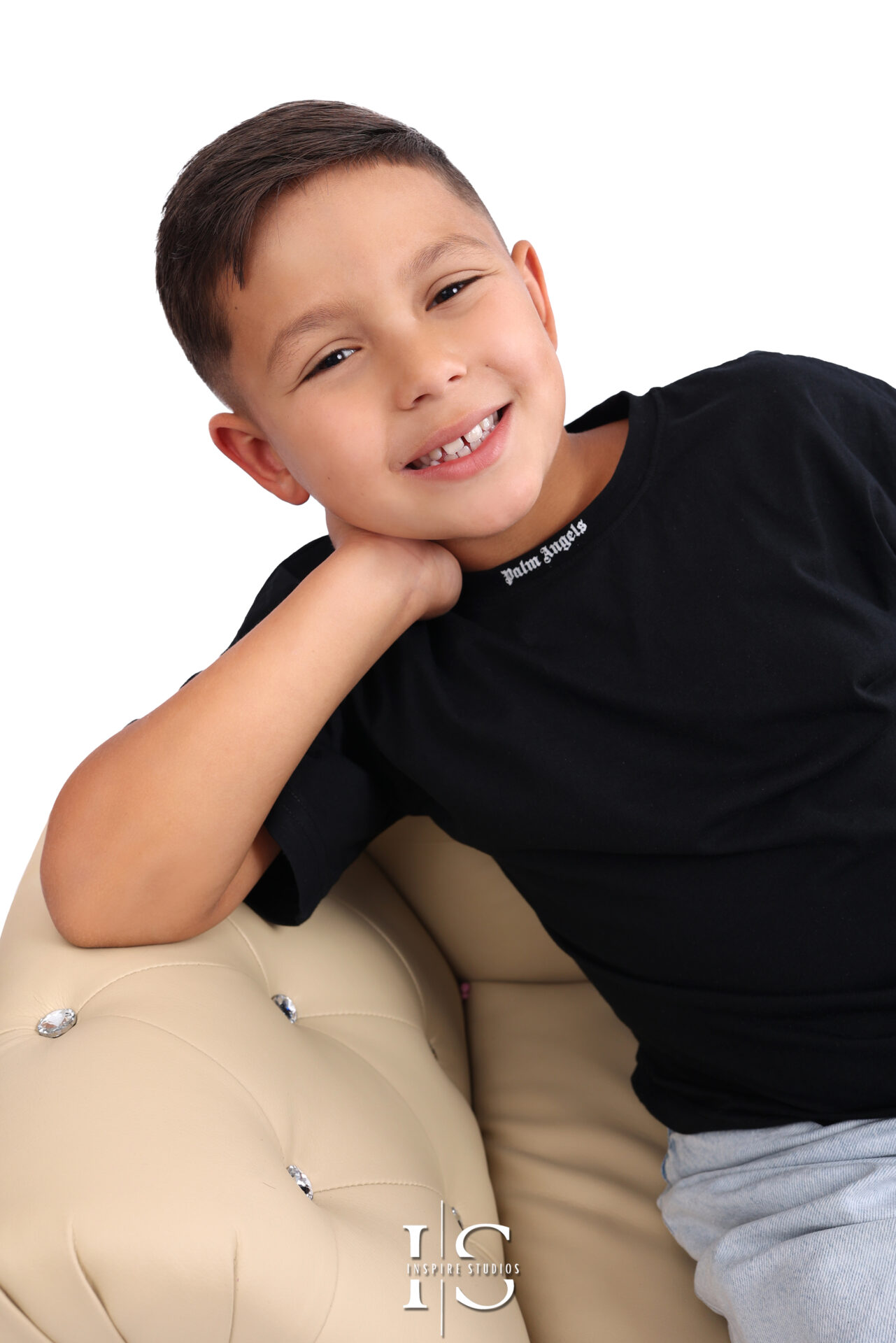 Professional studio headshot of a young child.