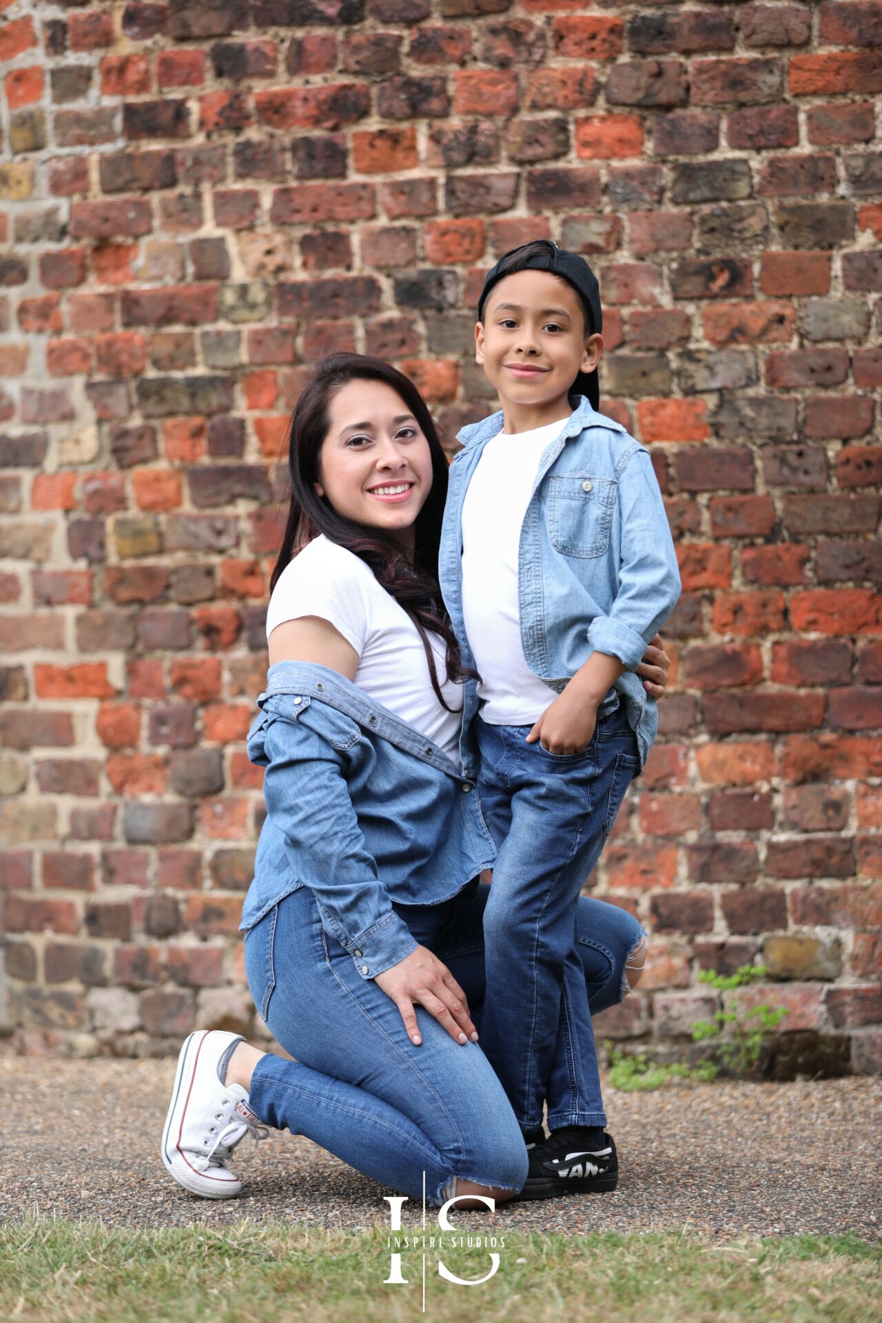 Relaxed family portraits in a London park, capturing genuine smiles and togetherness.