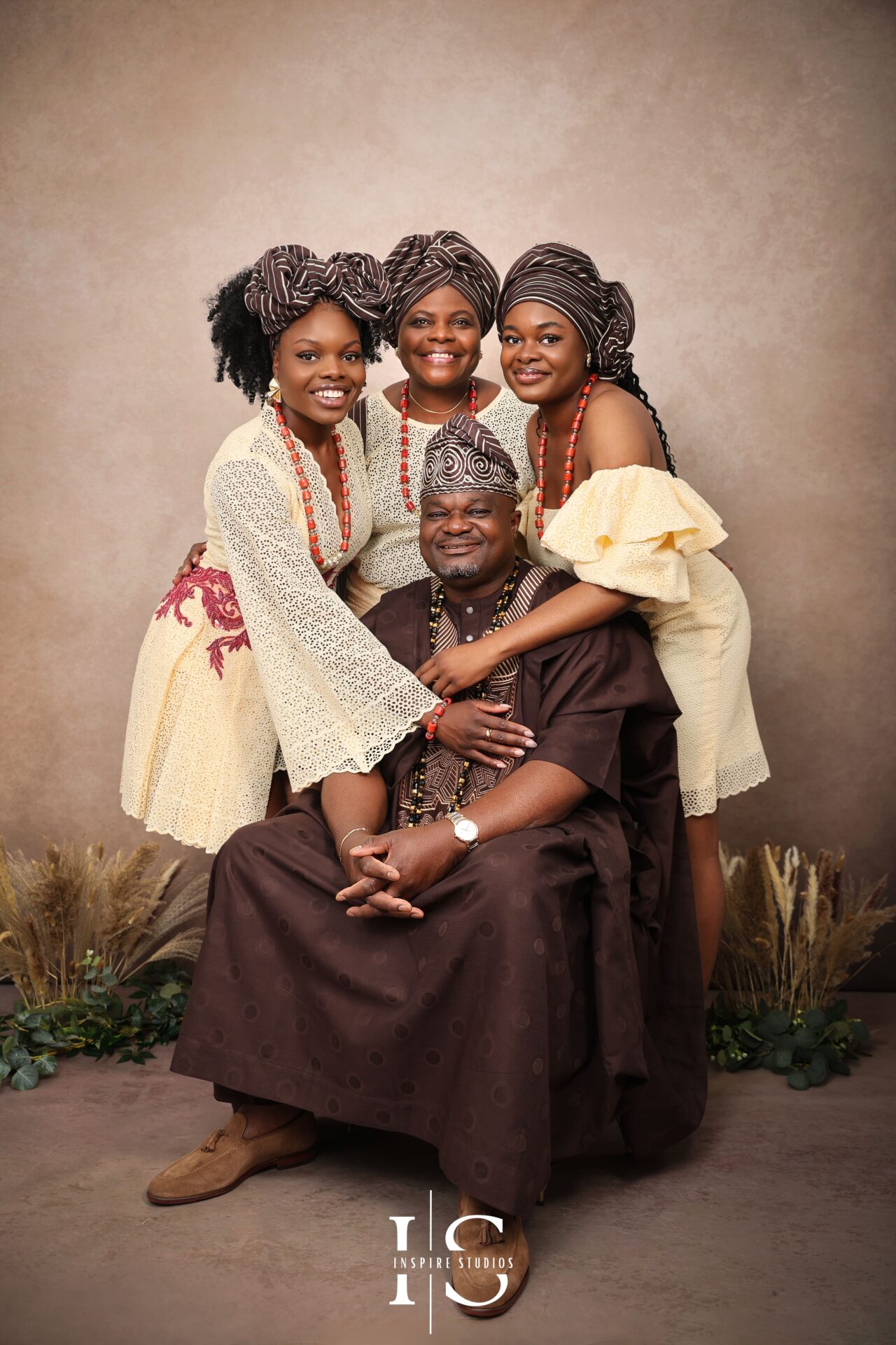 Family studio photoshoot in London featuring traditional African clothing and cultural heritage