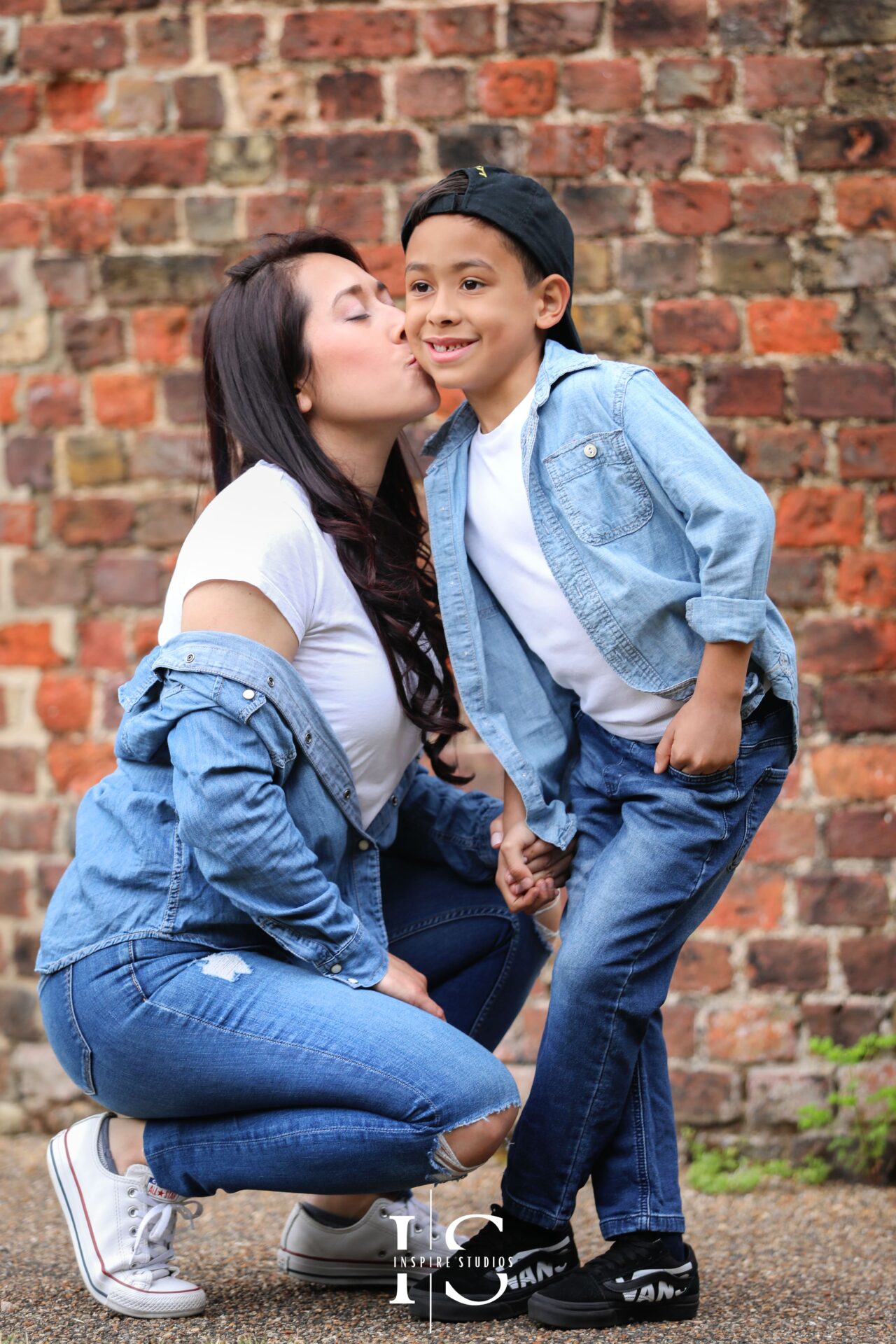 Candid portraits of parents and children enjoying a photoshoot in Valentines Park, London.