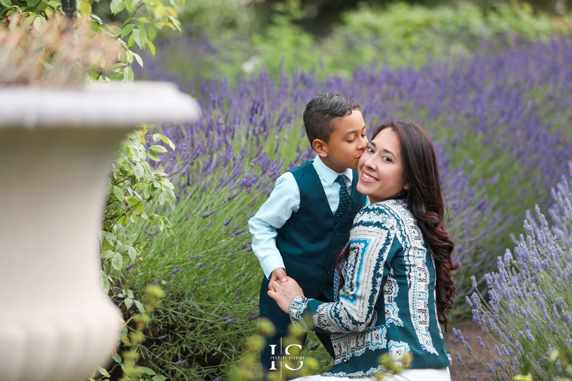 Family portraits taken in the scenic surroundings of Valentines Park, London.