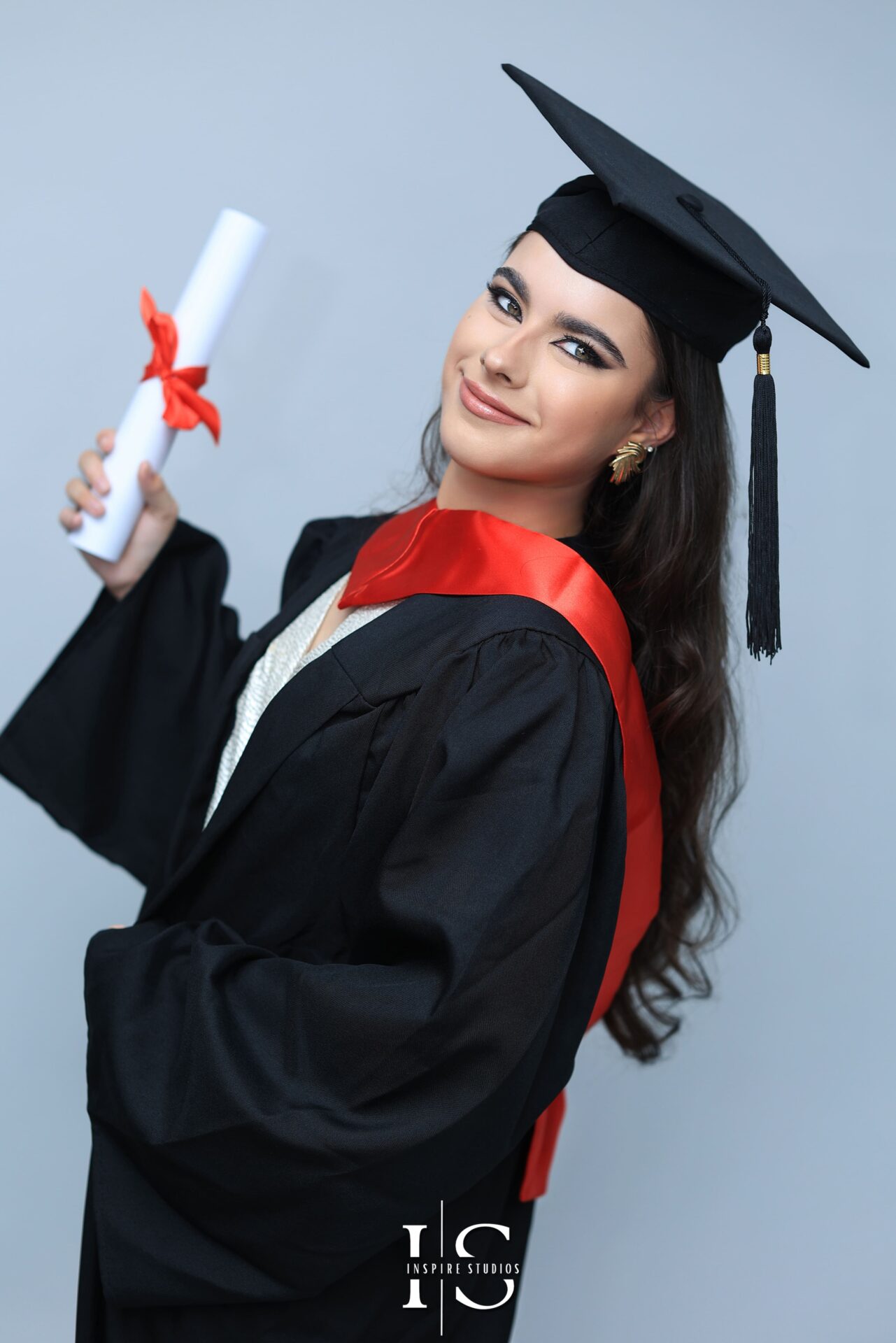 Professional graduation photoshoot in Walthamstow with student in cap and gown