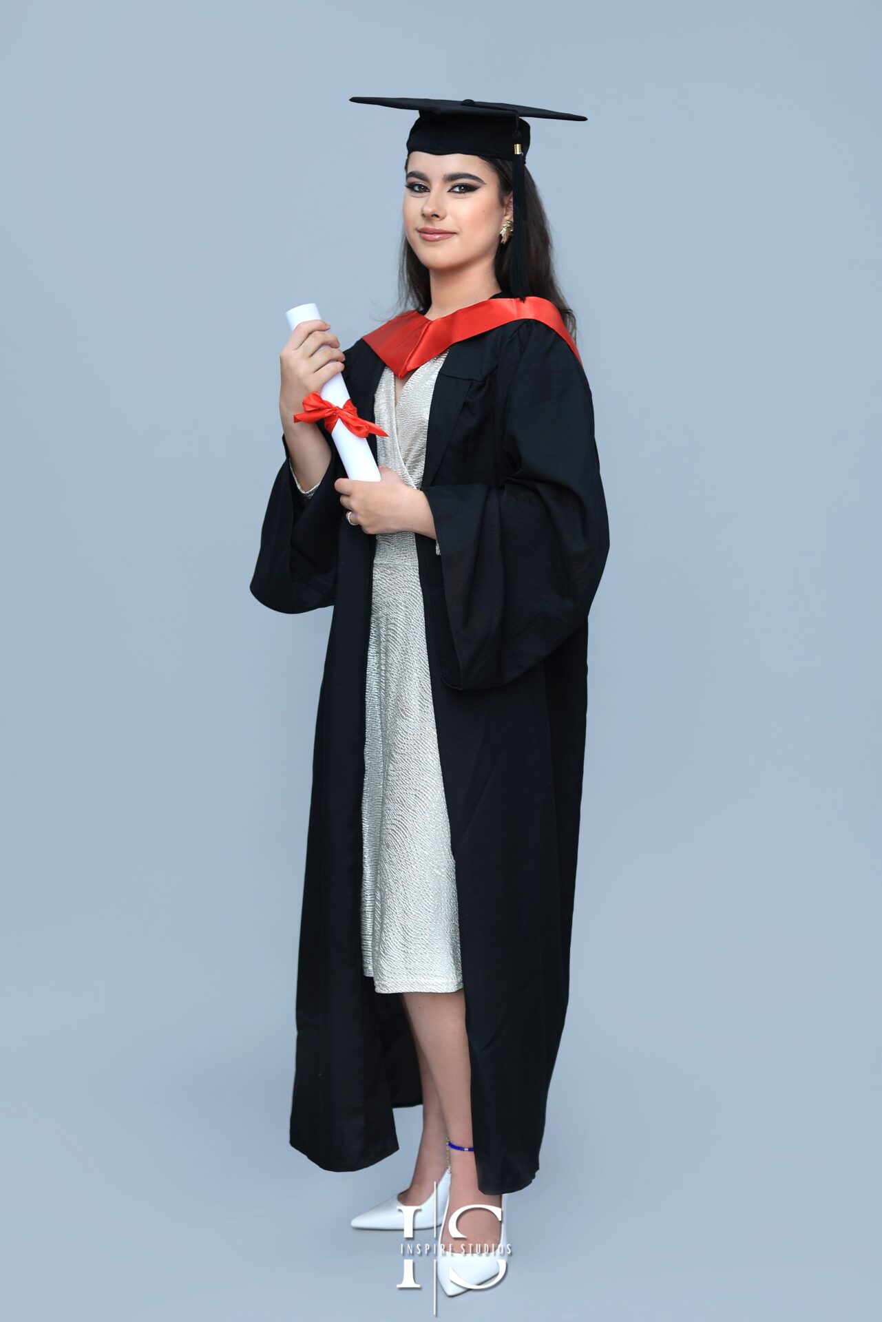 Walthamstow graduation studio session capturing student in gown with professional photography setup