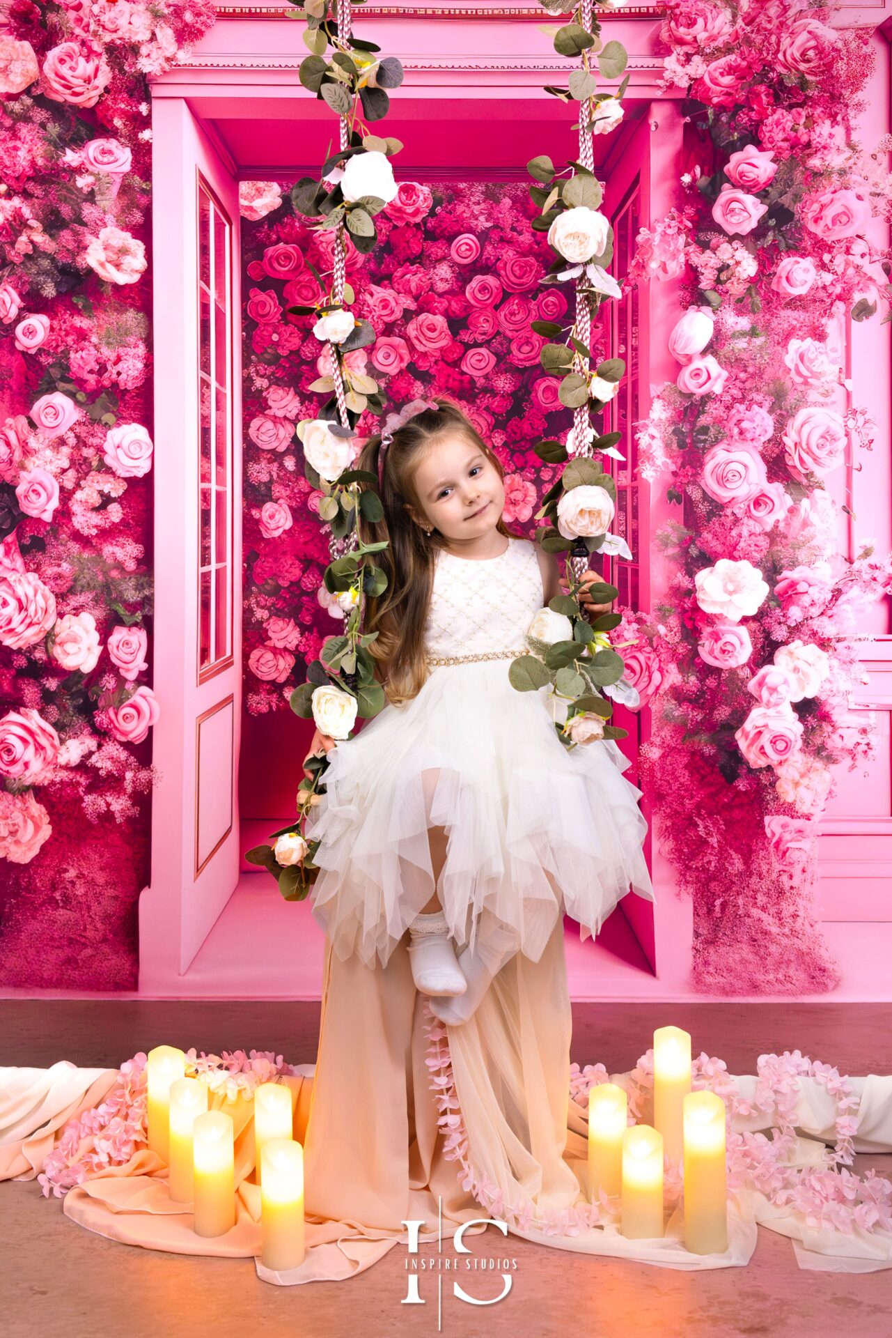 Professional Barbie studio birthday photoshoot in London with pink backdrops, luxury props, and themed outfits.