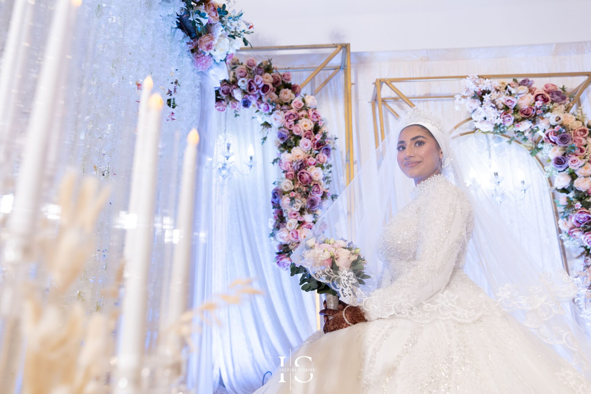 Bride candid photography on stage at Pavilion Banqueting Walthamstow, London – captured by Inspire Studios