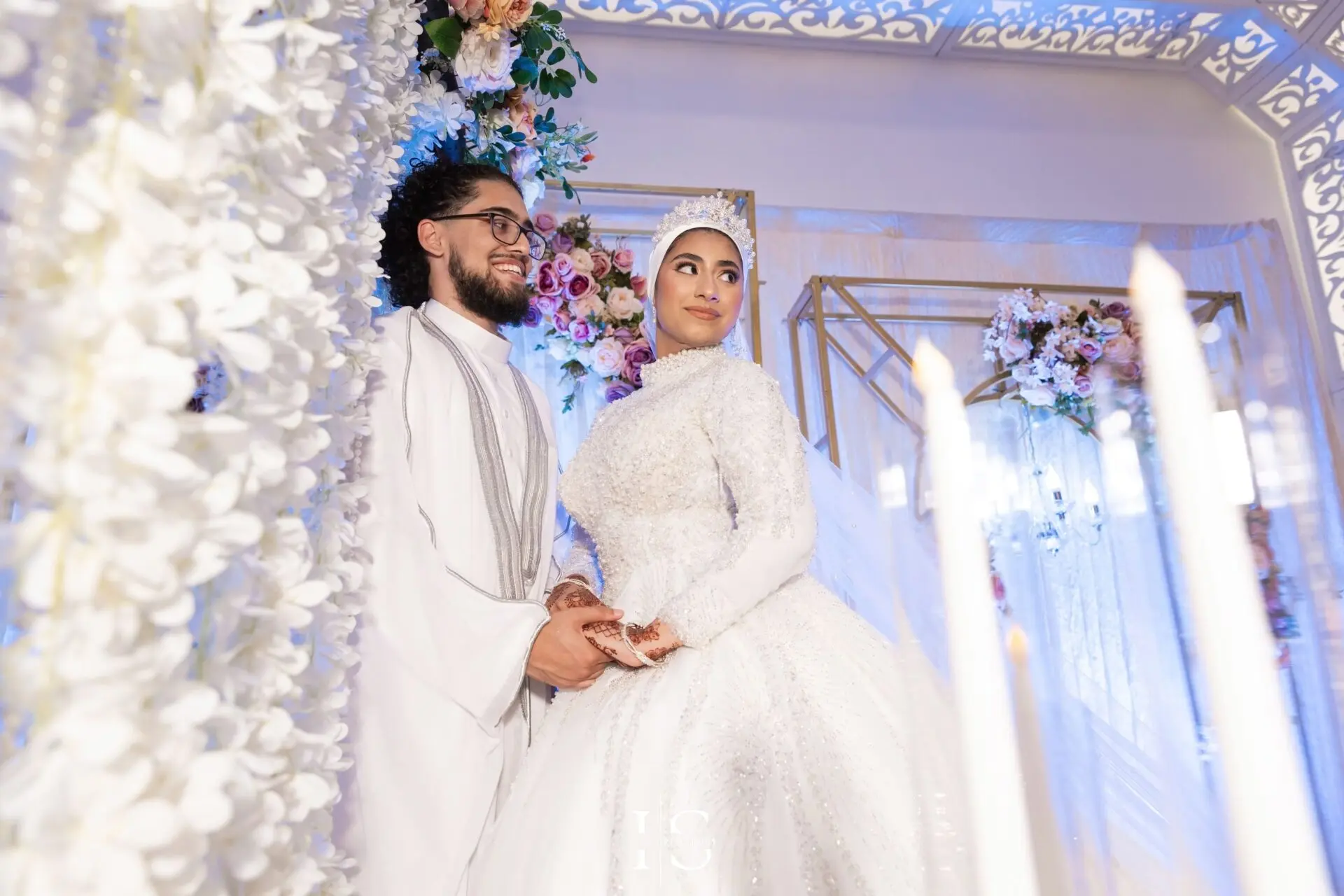 Bride and groom portrait on stage at Pavilion Banqueting Walthamstow, London – captured by Inspire Studios