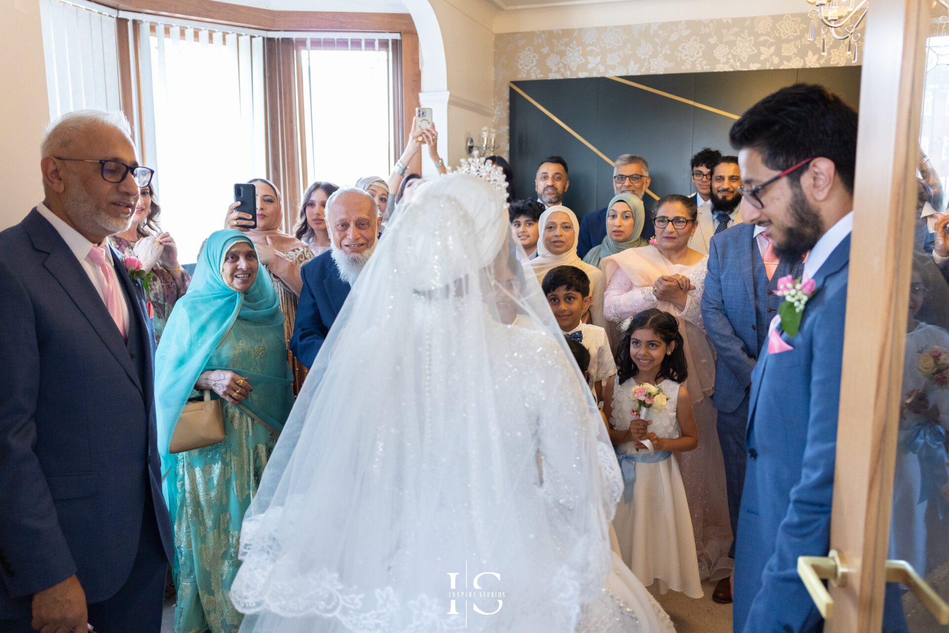 Bride’s grand entrance at Pavilion Banqueting Walthamstow, London – captured by Inspire Studios