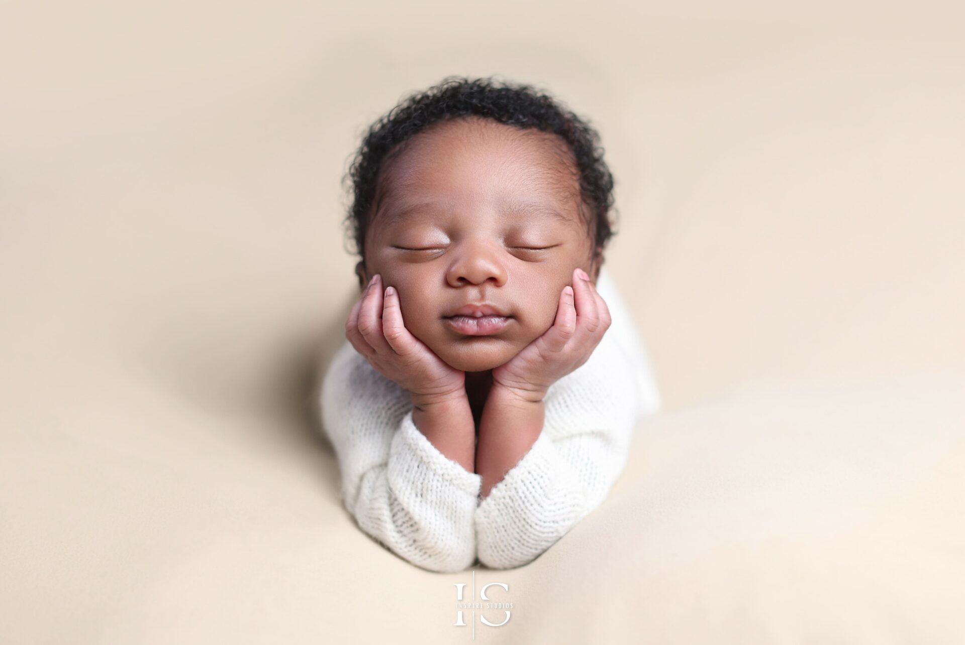 Newborn photography pose on beanbag – Inspire Studios Walthamstow London.