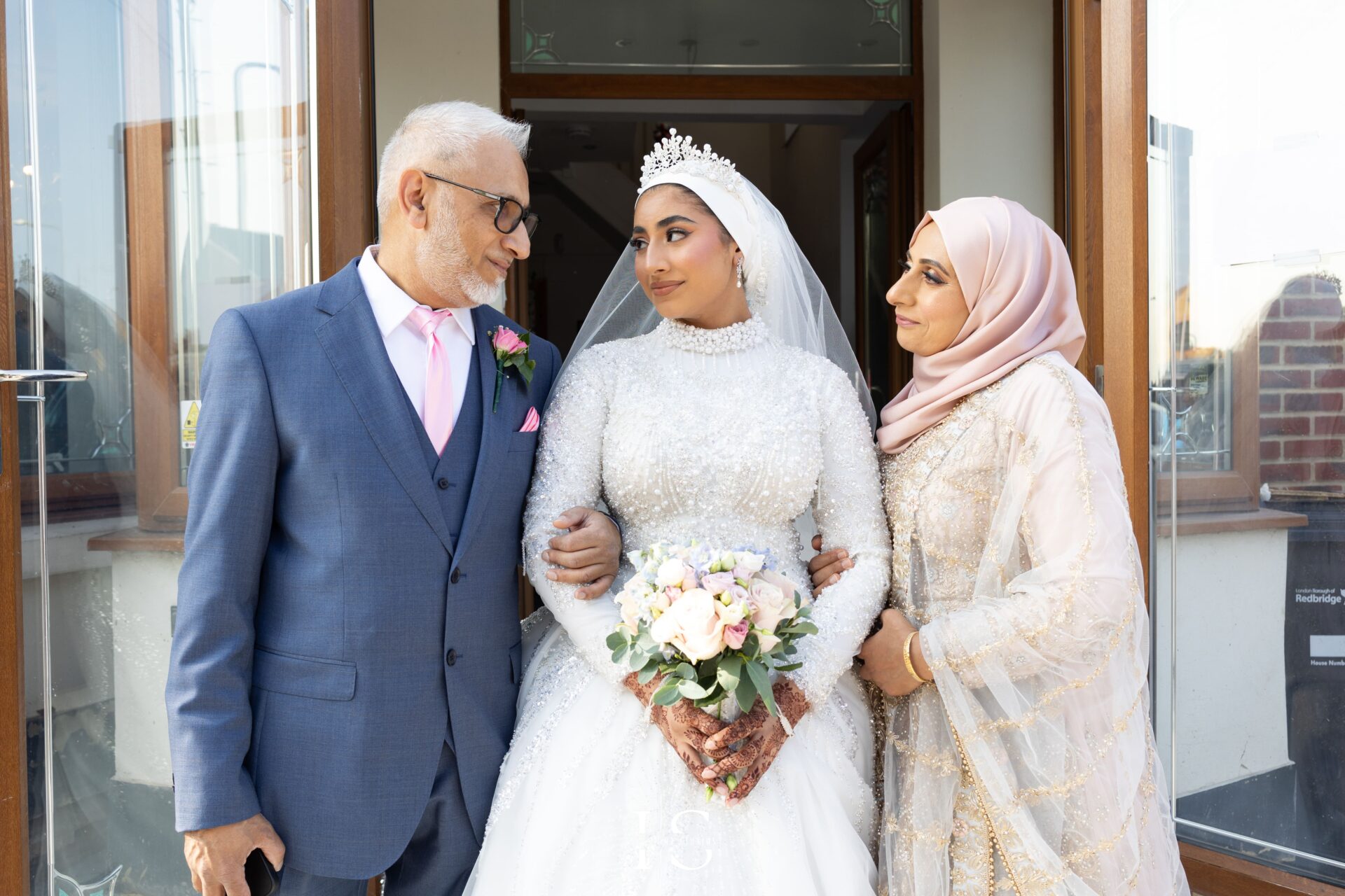Bride with her parents at home before Nikkah wedding – captured by Inspire Studios, Pavilion Banqueting Walthamstow, London