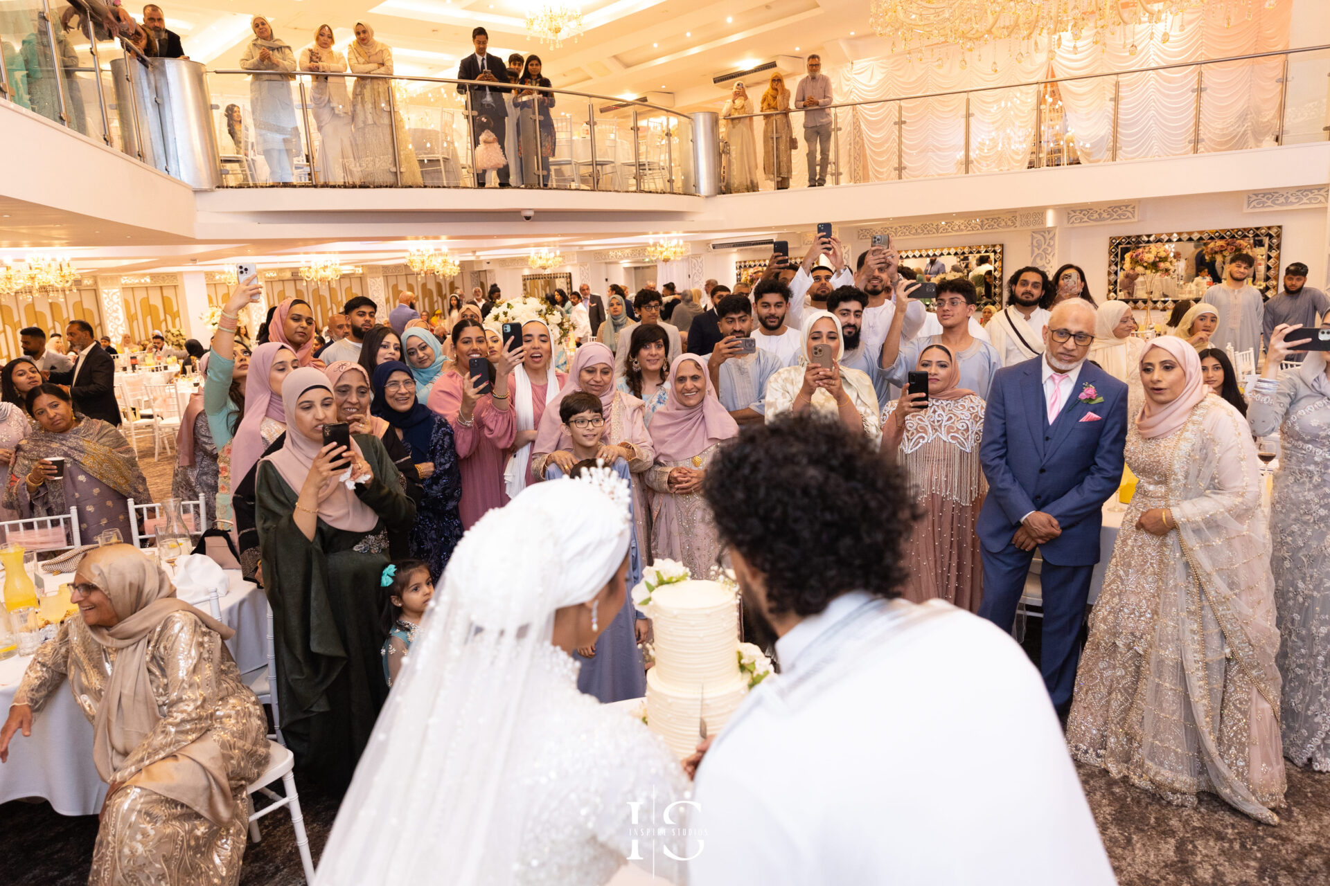 Bride, groom and guests candid photo at Pavilion Banqueting Walthamstow, London – captured by Inspire Studios