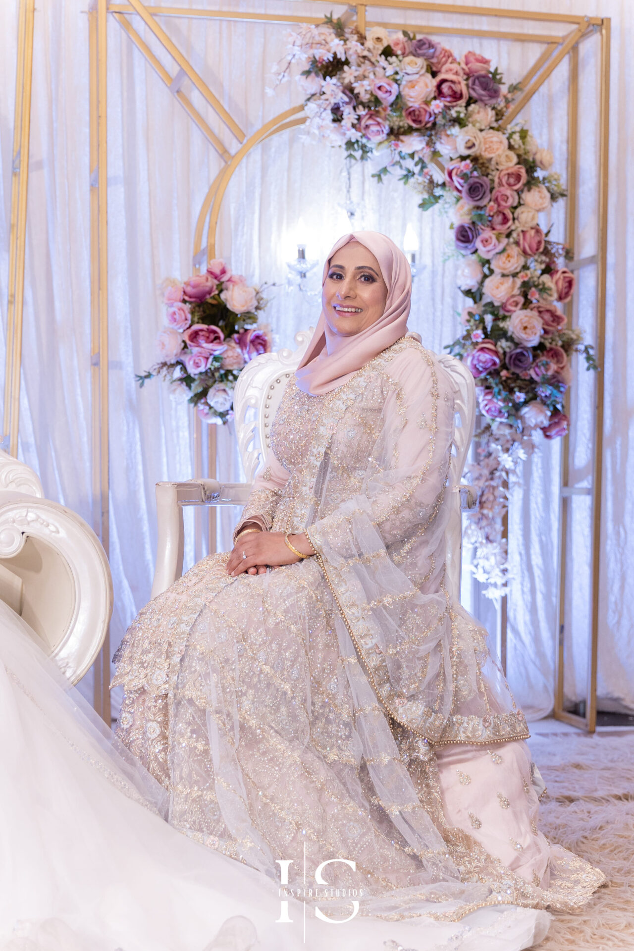 Bride’s mother on stage during Nikkah wedding at Pavilion Banqueting Walthamstow, London – captured by Inspire Studios