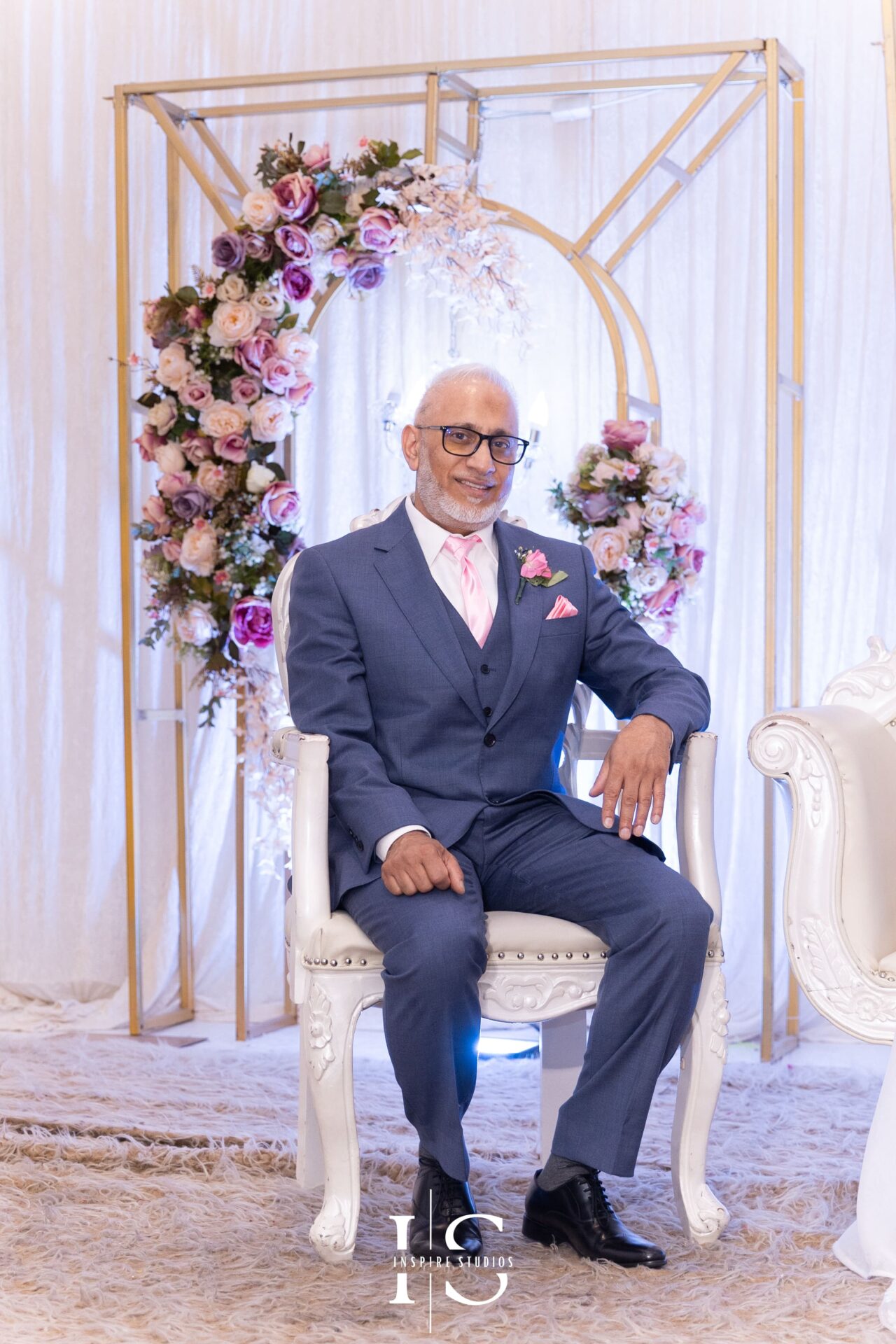 Bride’s father on stage during Nikkah wedding at Pavilion Banqueting Walthamstow, London – captured by Inspire Studios