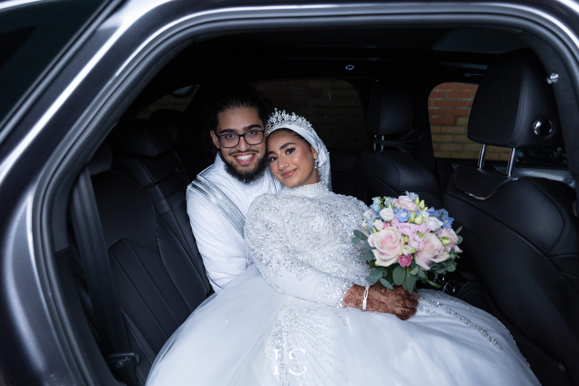 Bride and groom leaving Pavilion Banqueting Walthamstow after Nikkah wedding – captured by Inspire Studios
