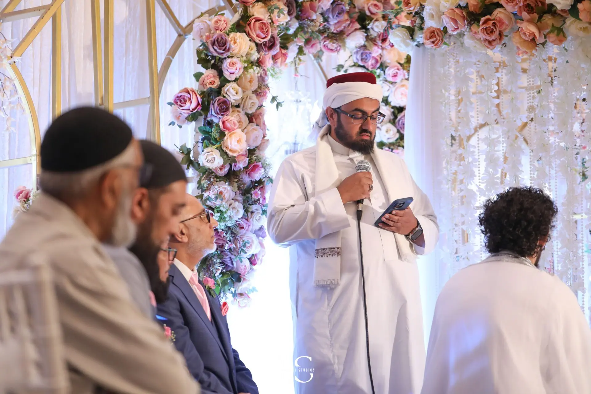 Candid photo during Nikkah ceremony at Pavilion Banqueting Walthamstow, London – captured by Inspire Studios