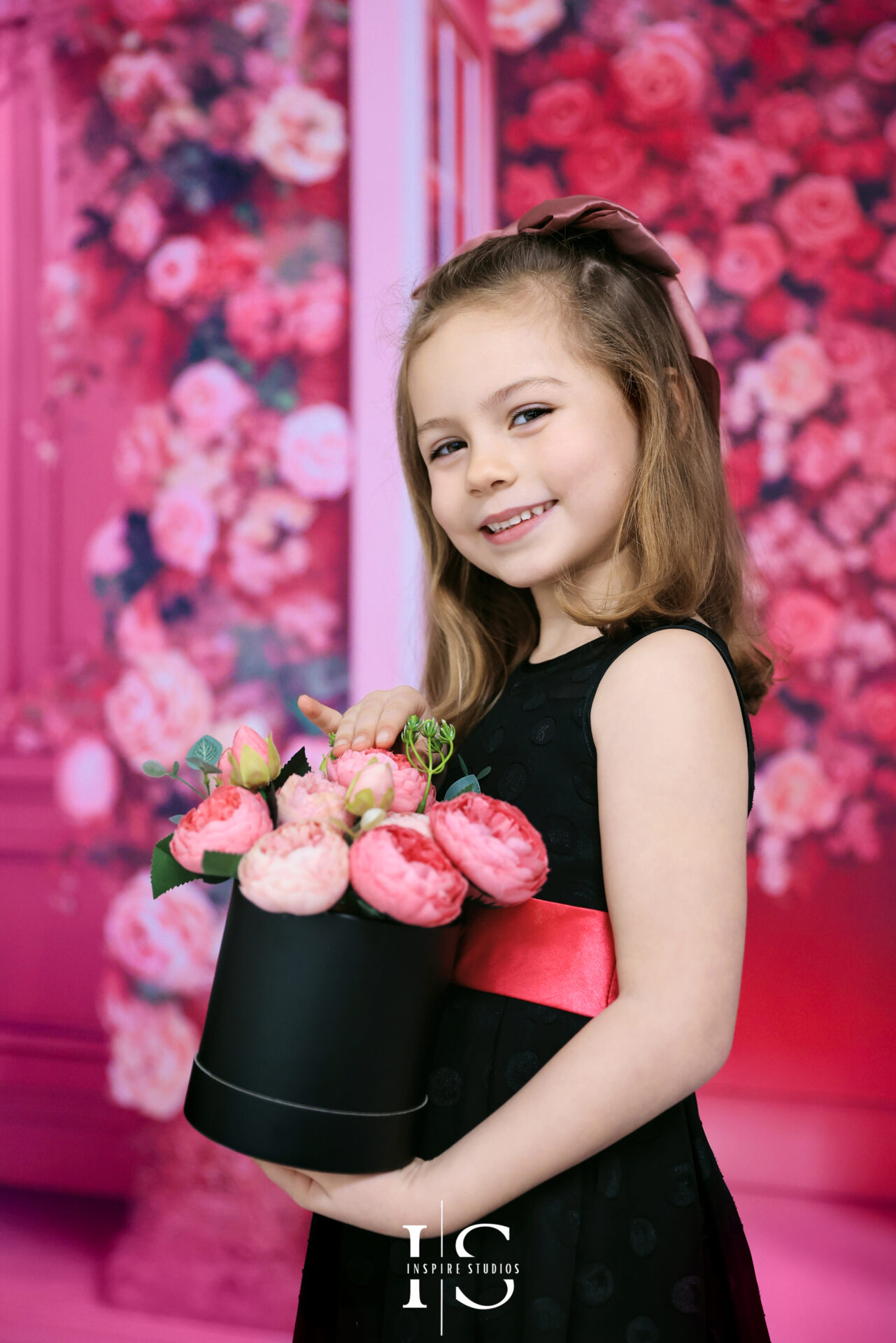Young girl posing for her birthday studio photoshoot in London with bright and playful setup