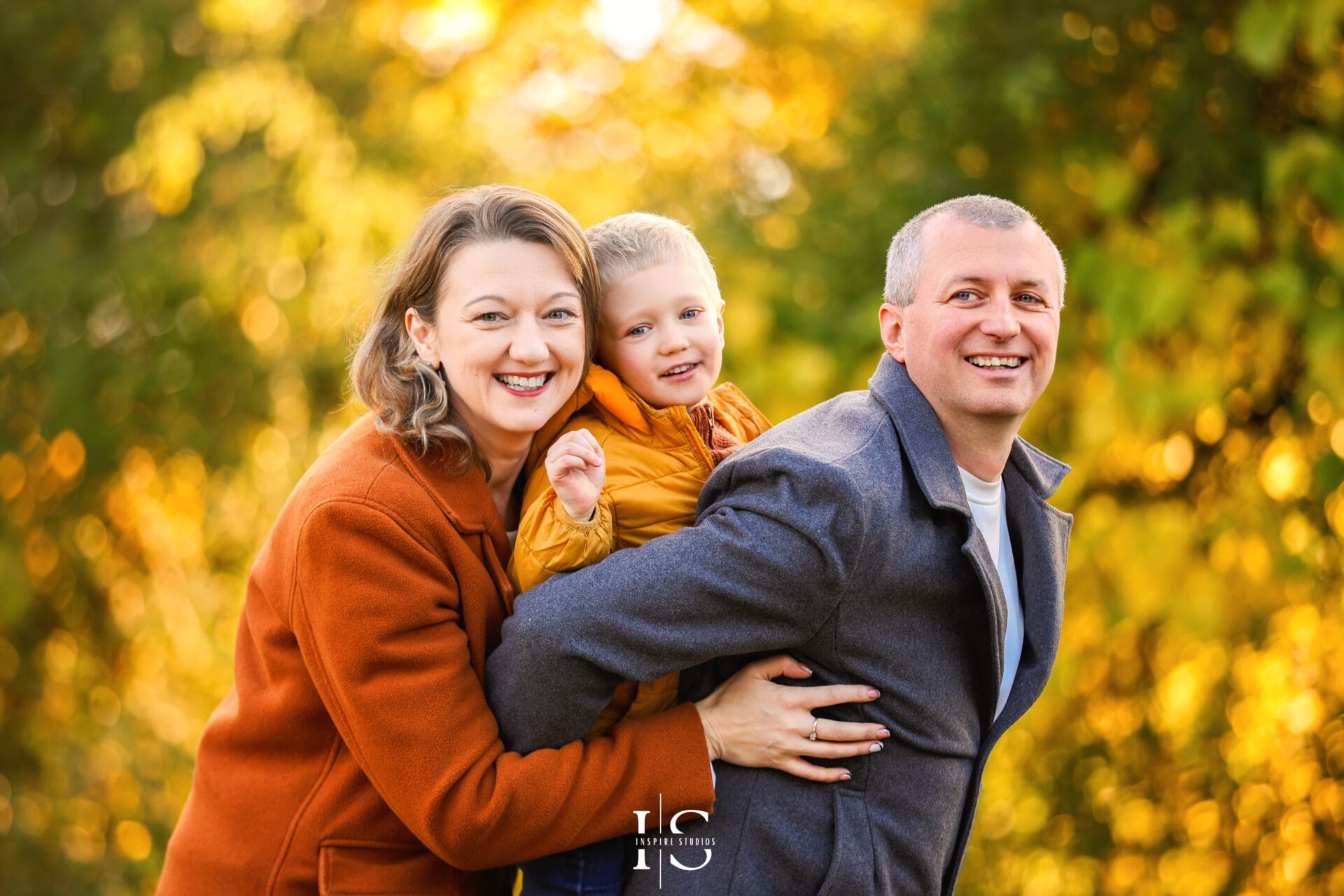 Autumn outdoor photoshoot in London with vibrant fall foliage and natural portrait backdrops.