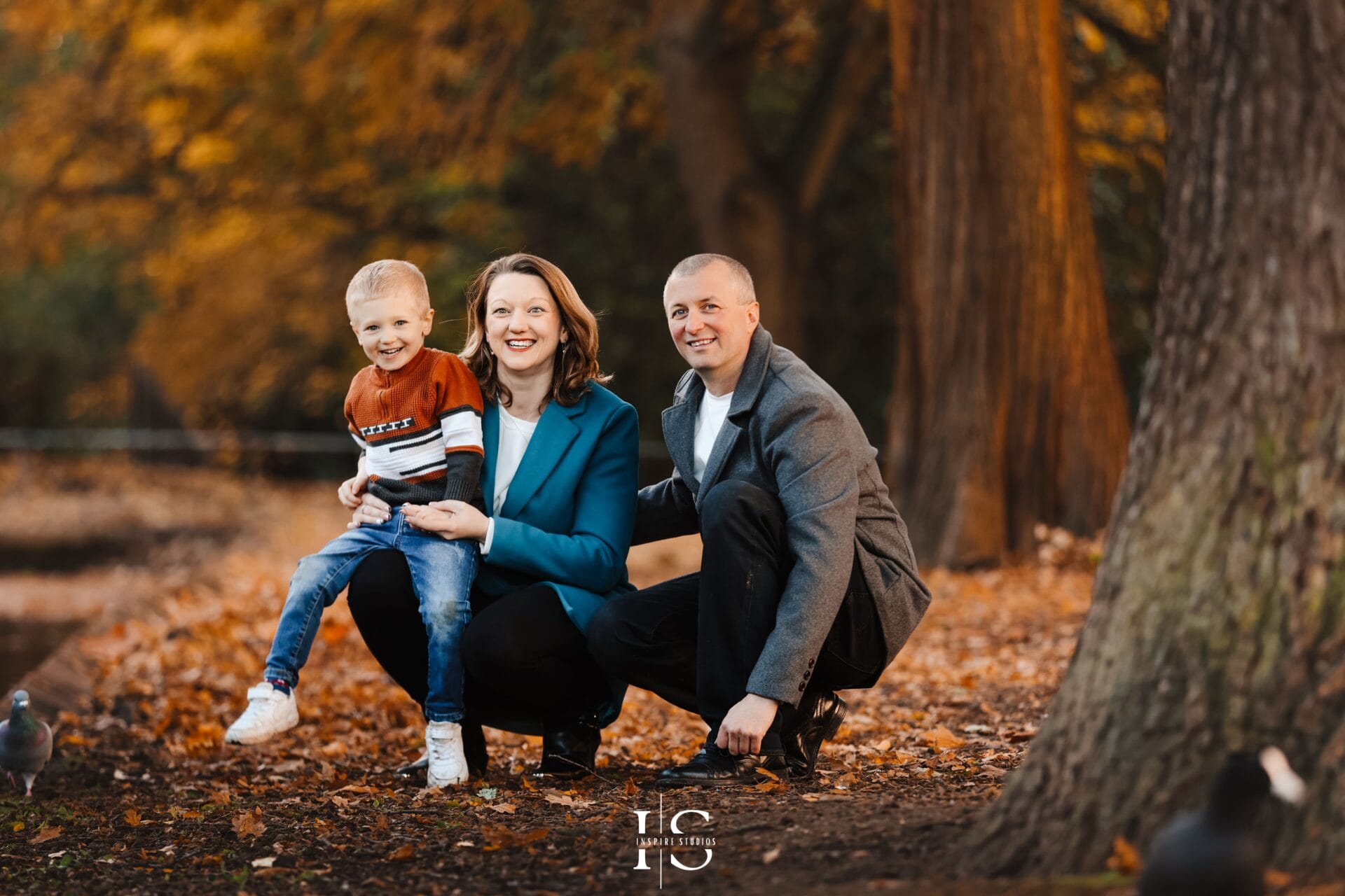 Autumn outdoor photoshoot in Valentines Park with vibrant fall foliage and natural portrait backdrops.