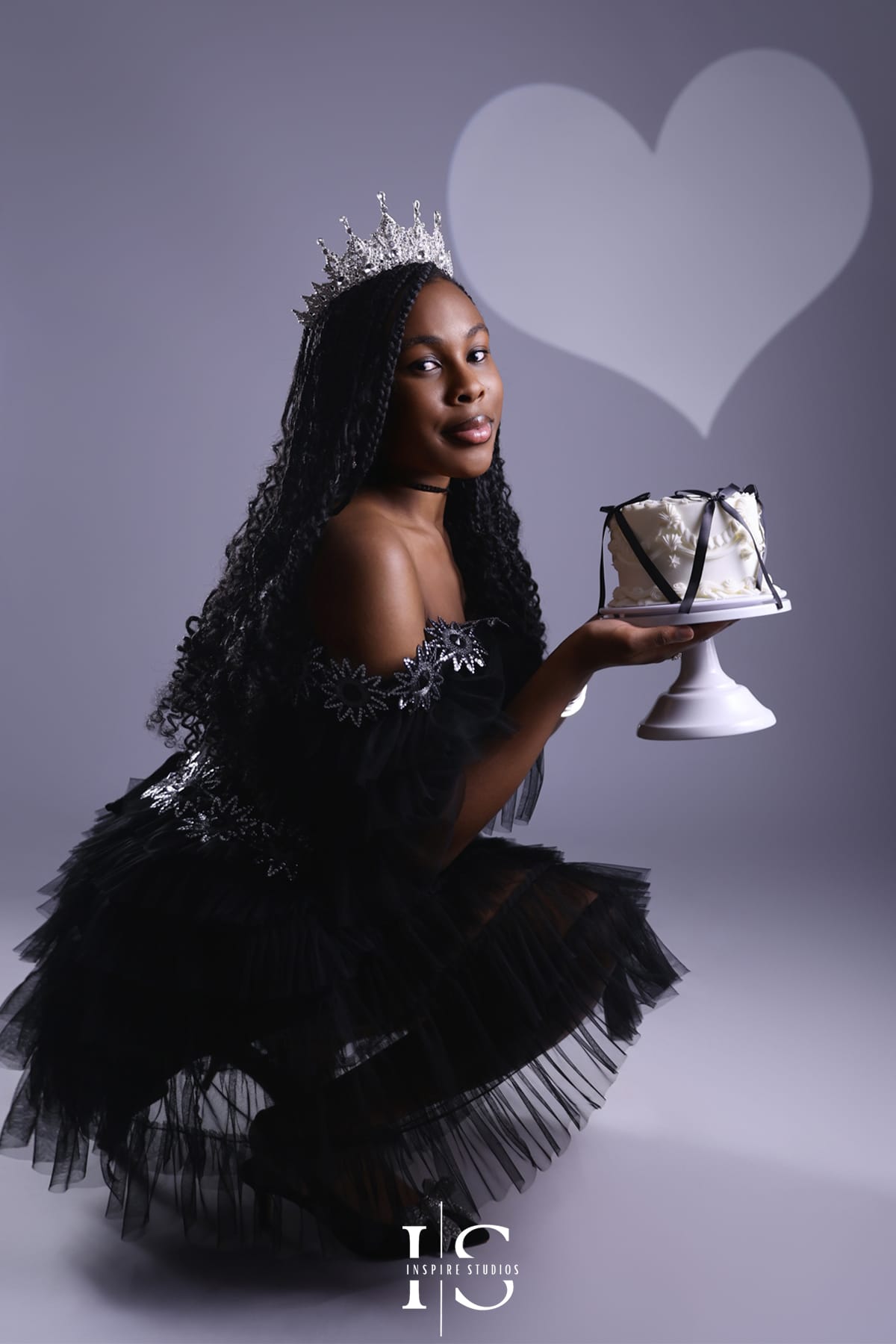 14th birthday spotlight photoshoot in a professional London studio featuring a teenage girl posing under studio lights