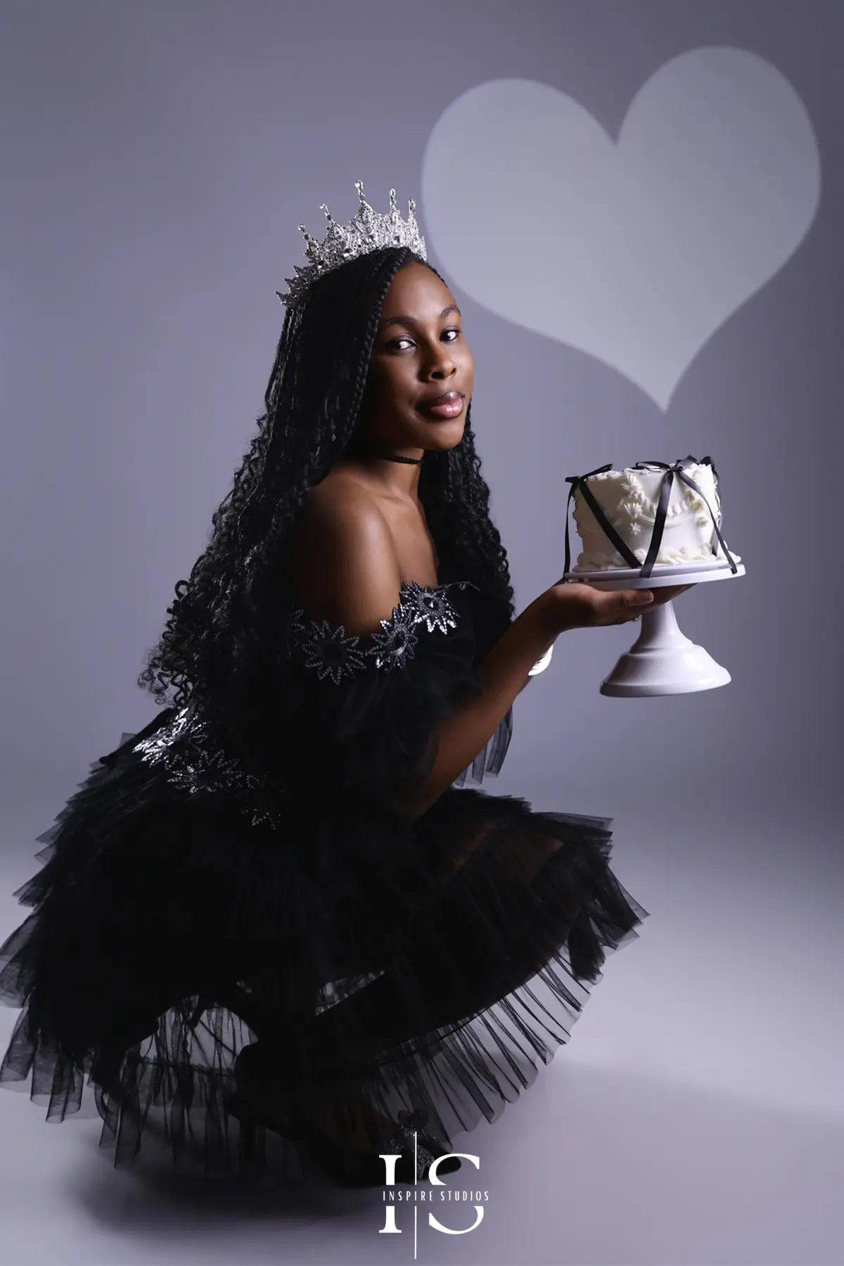 14th birthday spotlight photoshoot in a professional London studio featuring a teenage girl posing under studio lights