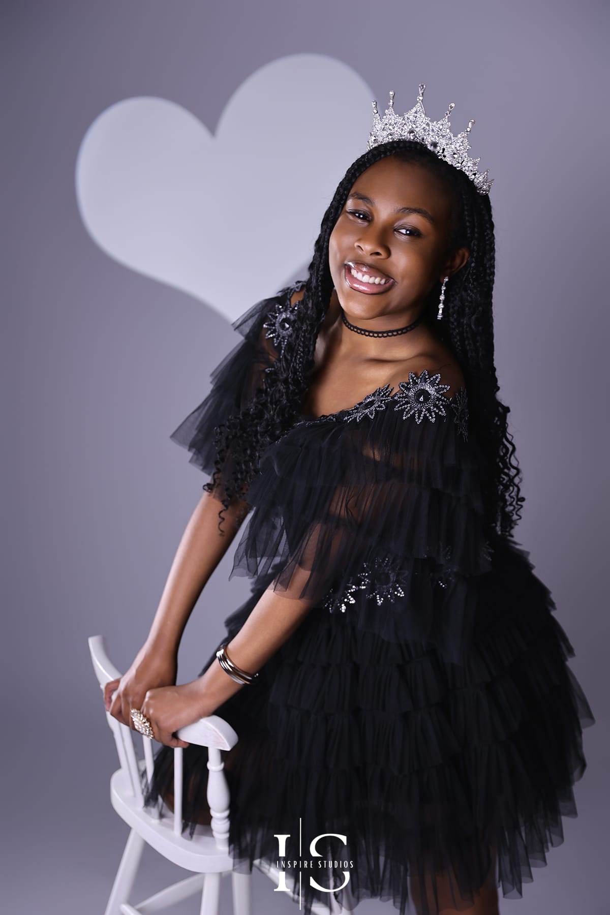 14th birthday studio photoshoot in London with a teenage girl posing confidently against a professional studio backdrop
