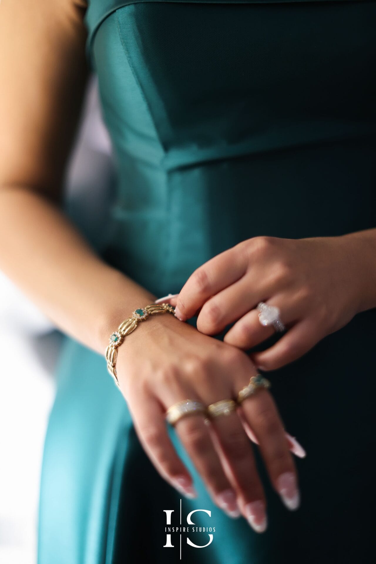 Bride getting ready shots in London capturing makeup, dress details, jewellery, and emotional bridal preparation moments.