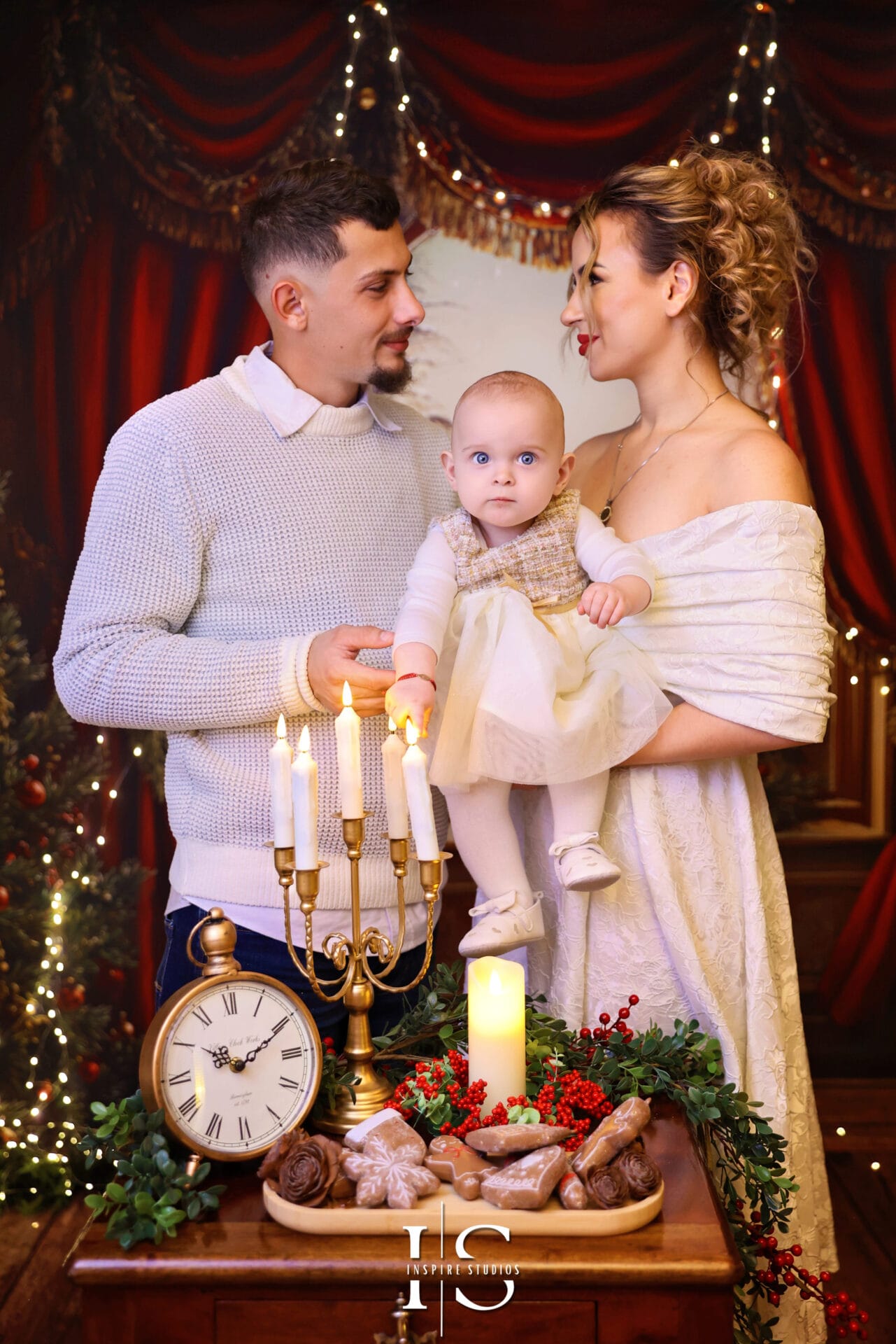 Luxury family festive Christmas photoshoot in a styled studio