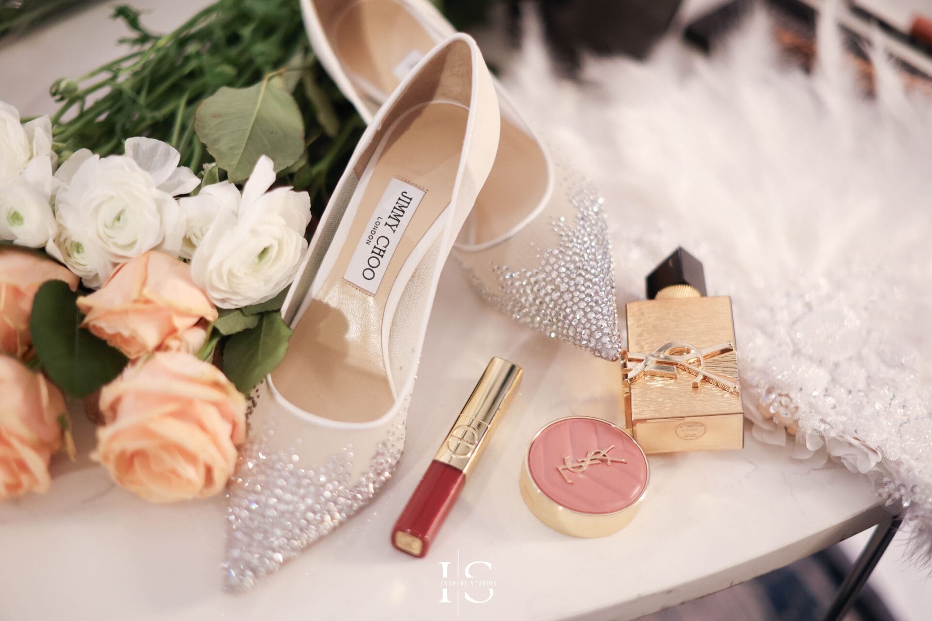 Female photographer at Marriott Grosvenor Square capturing luxury wedding portraits, ceremony moments, and elegant venue details.