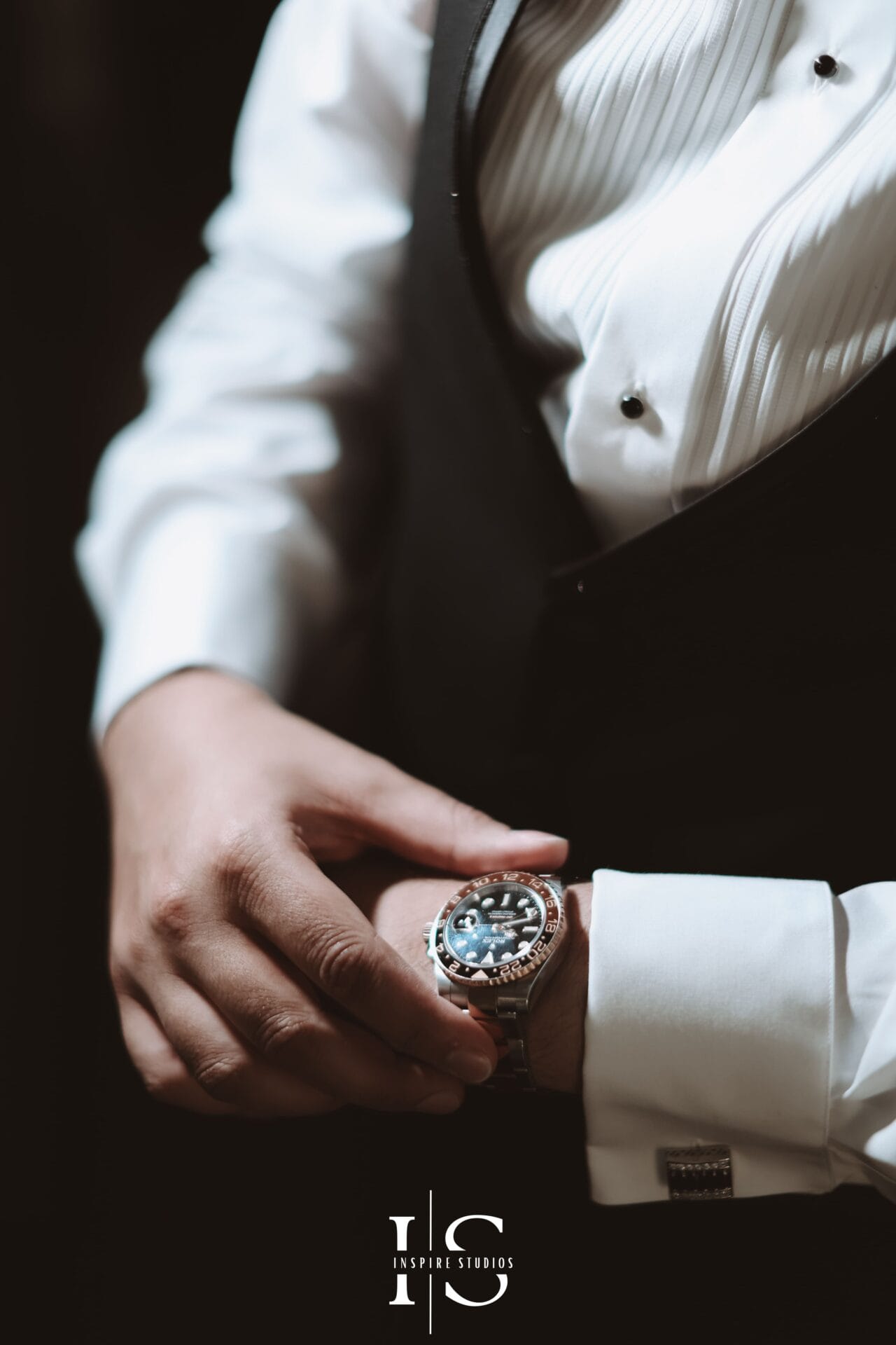 Luxury groom portrait photography at Marriott Hotel capturing tailored suit details and elegant wedding day style.