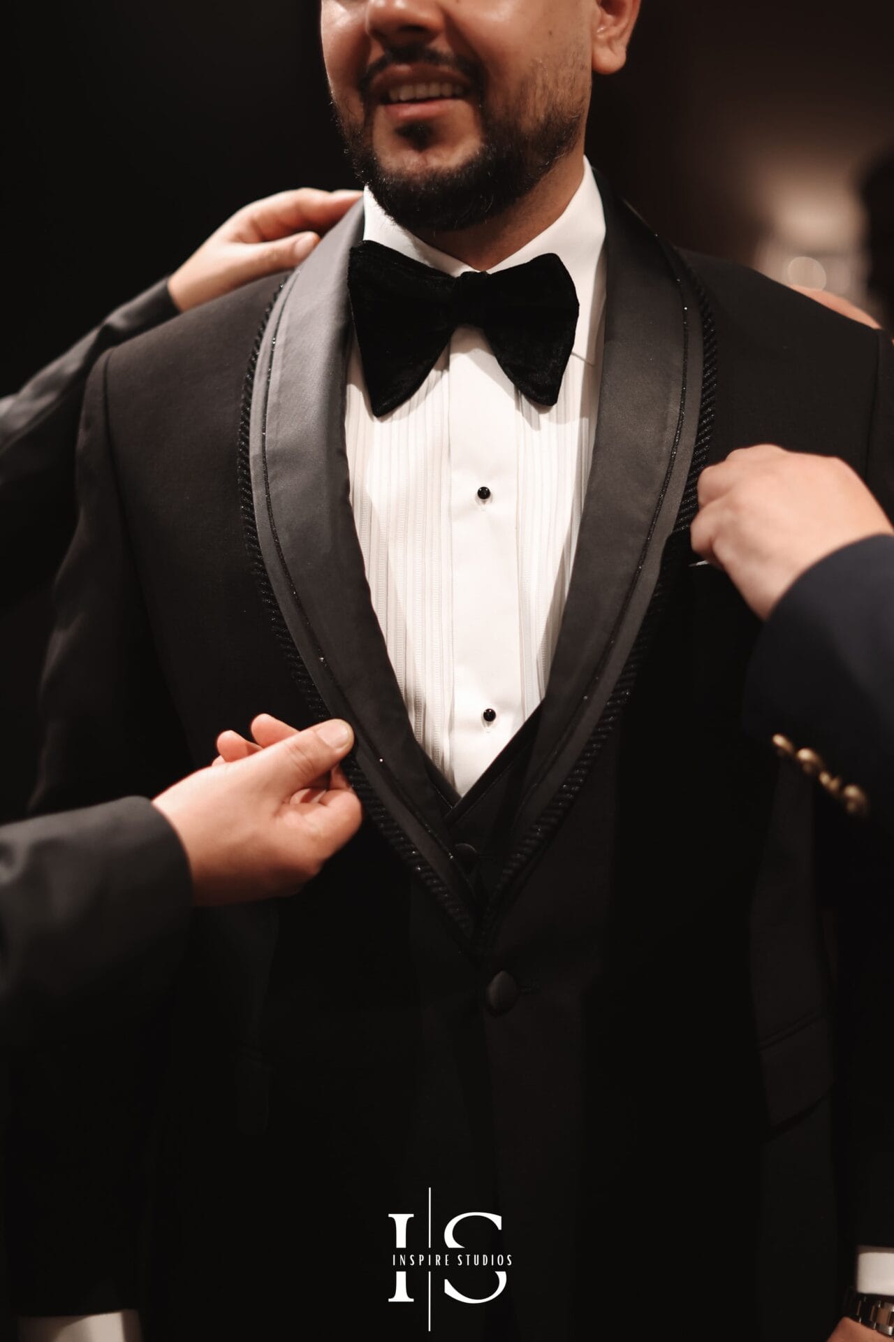 Groom and groomsmen luxury wedding photography at Marriott Grosvenor Square capturing portraits, suits, and celebration moments.