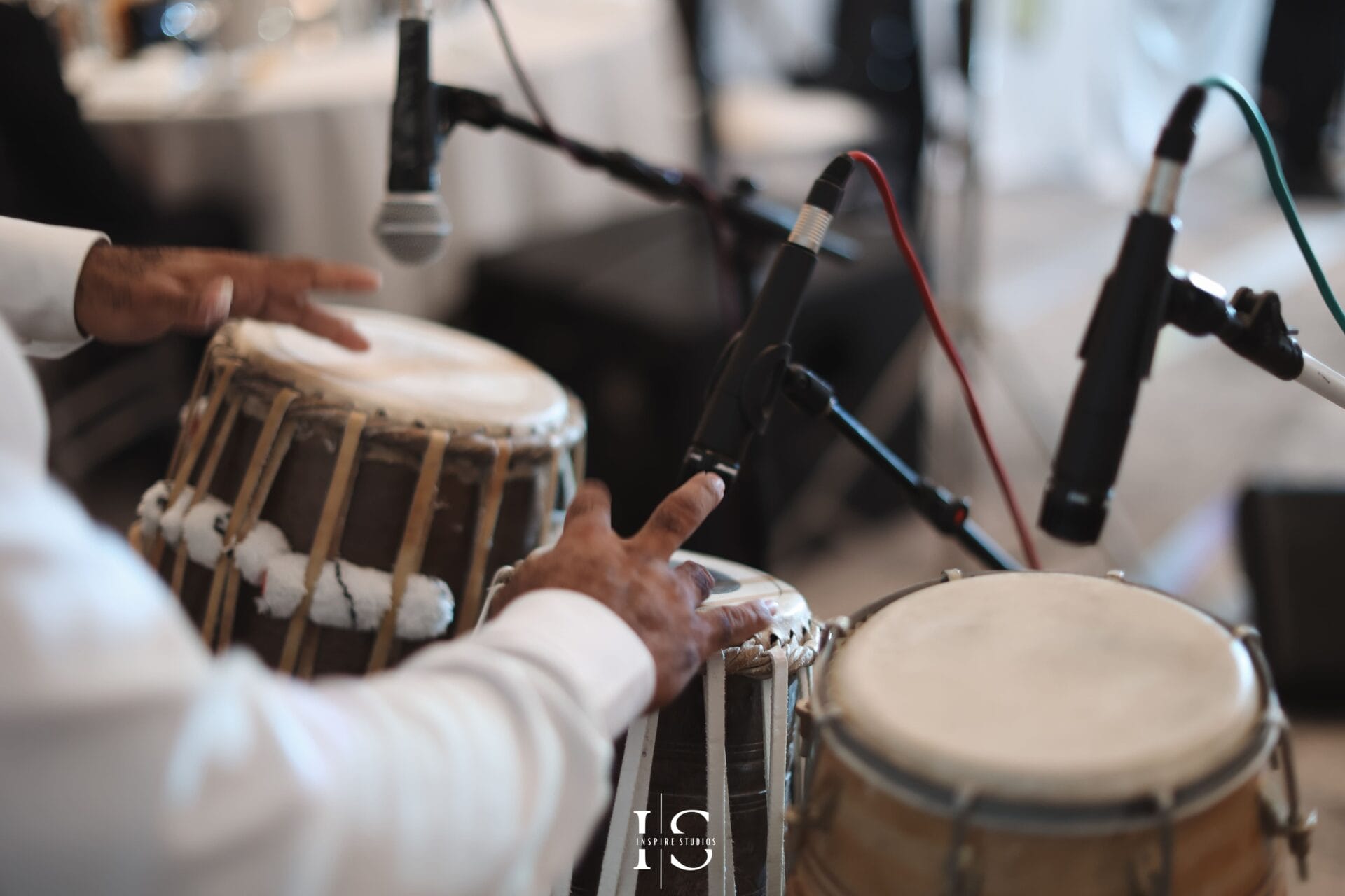 Female wedding photographer capturing Hamayoun Angar performance moments, guests, and luxury wedding celebration details.