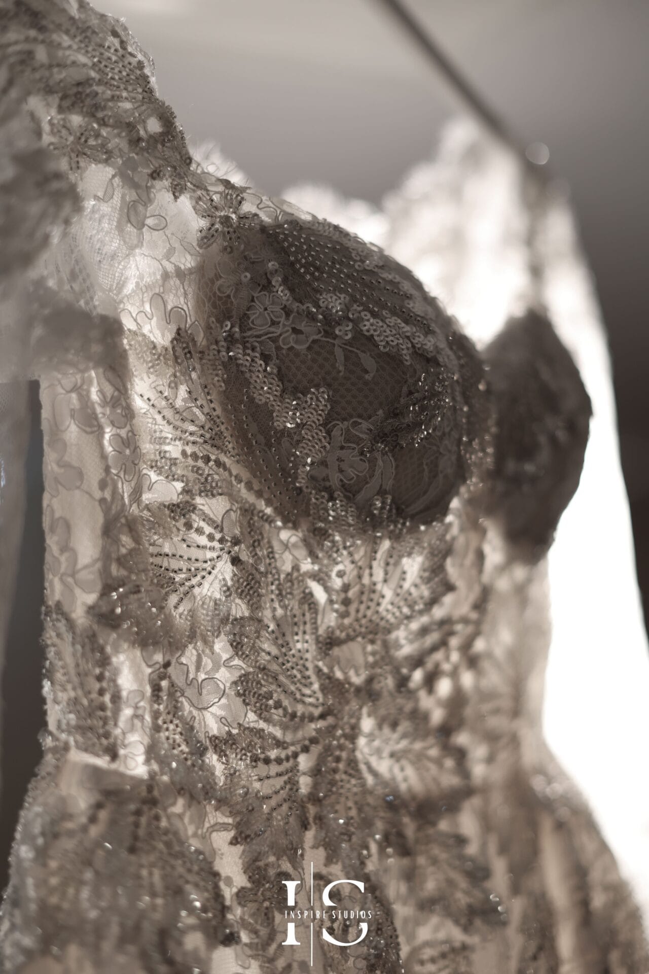 Luxury bridal dress photography capturing elegant fabric, designer details, veil, and timeless bridal styling.