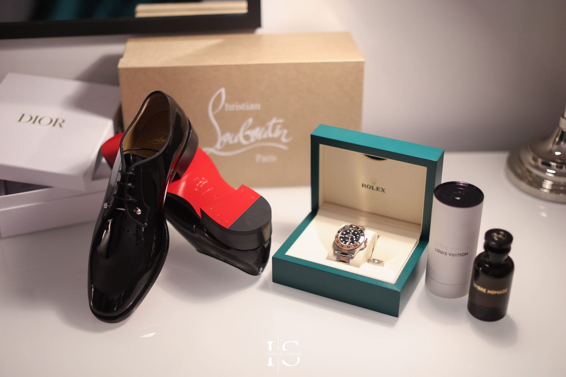 Luxury Marriott Hotel wedding accessories photography capturing bridal shoes, jewellery, perfume, invitations, and elegant details.