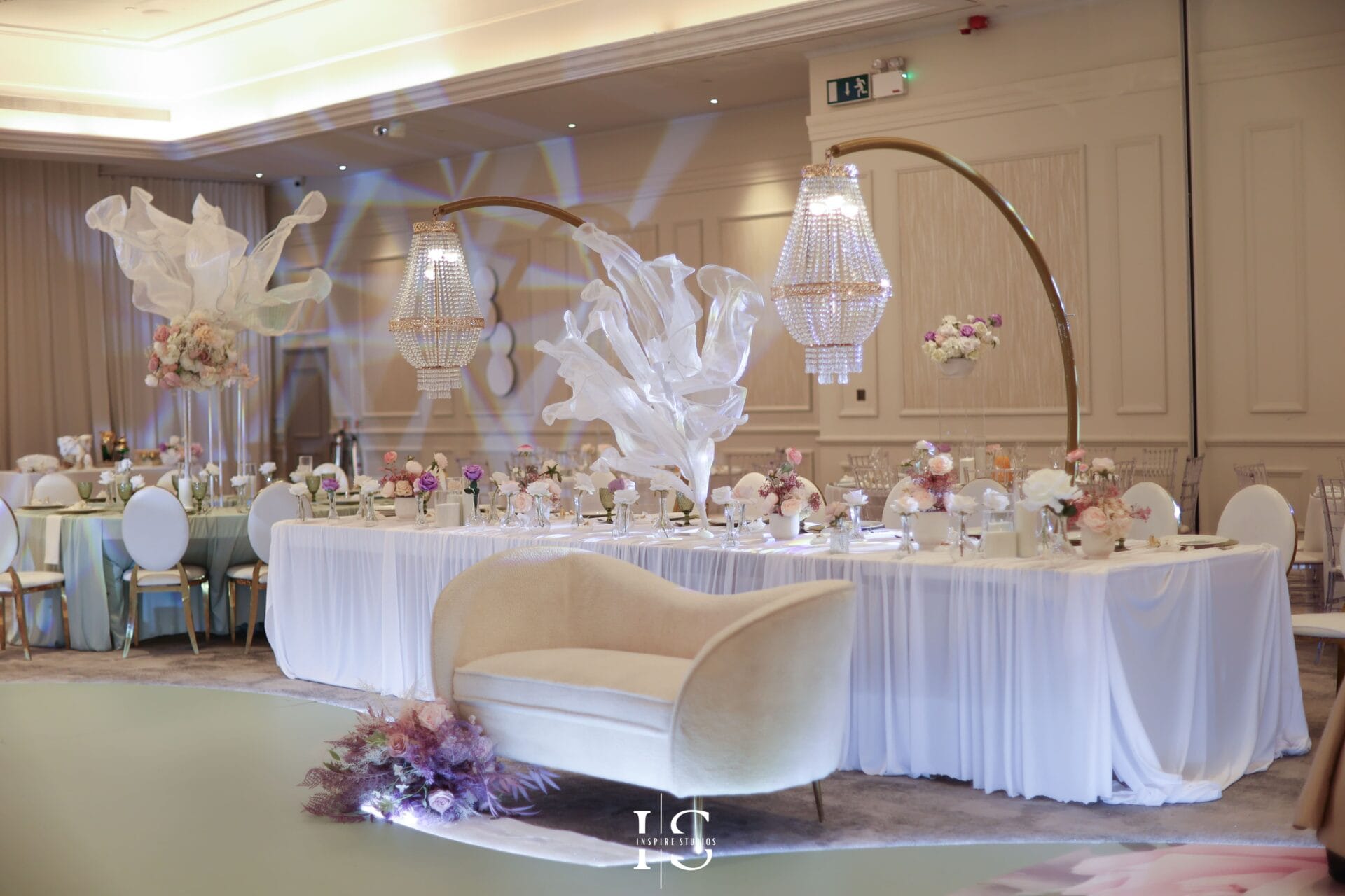 Luxury wedding reception photography in London capturing elegant table décor, floral styling, speeches, guests, and celebration moments.
